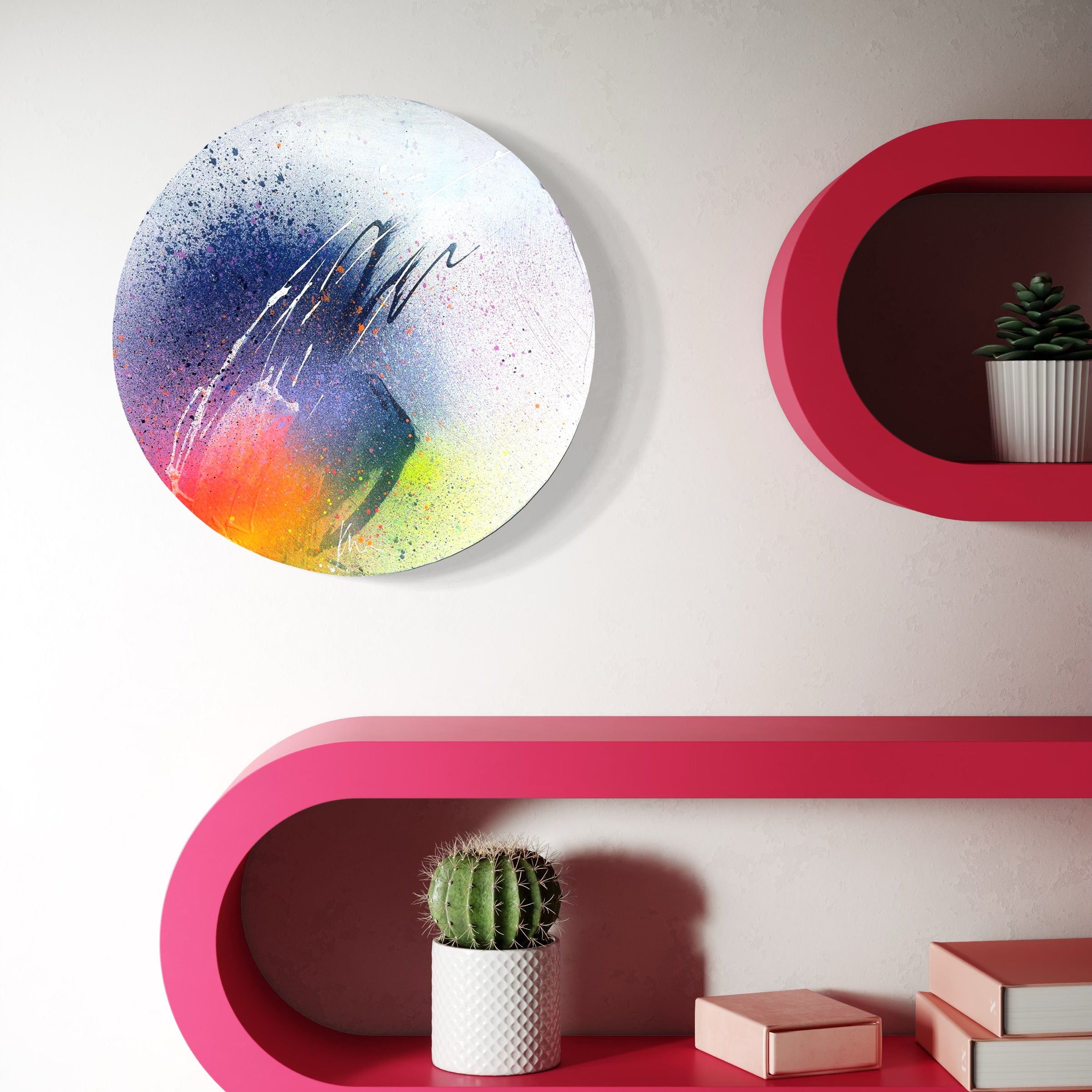 Right Here, Right Now," an abstract by Kate Mayer, decorates the round canvas above pink shelves with a cactus and plant pot.