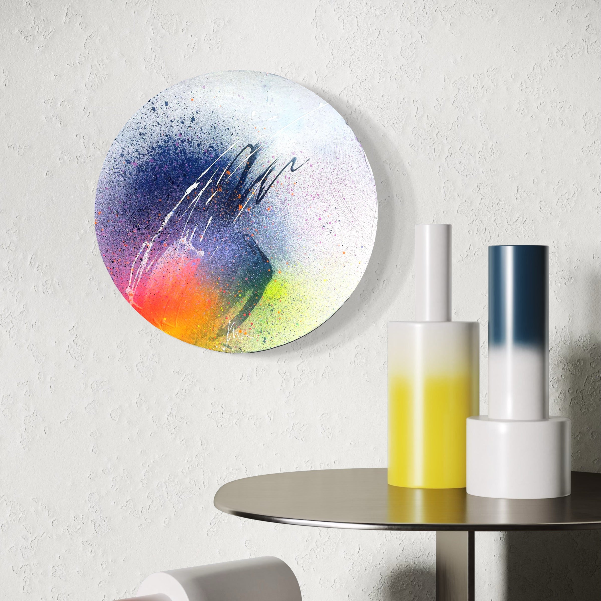 Kate Mayer's "Right Here, Right Now" painting is showcased above a table with gradient-colored vases.