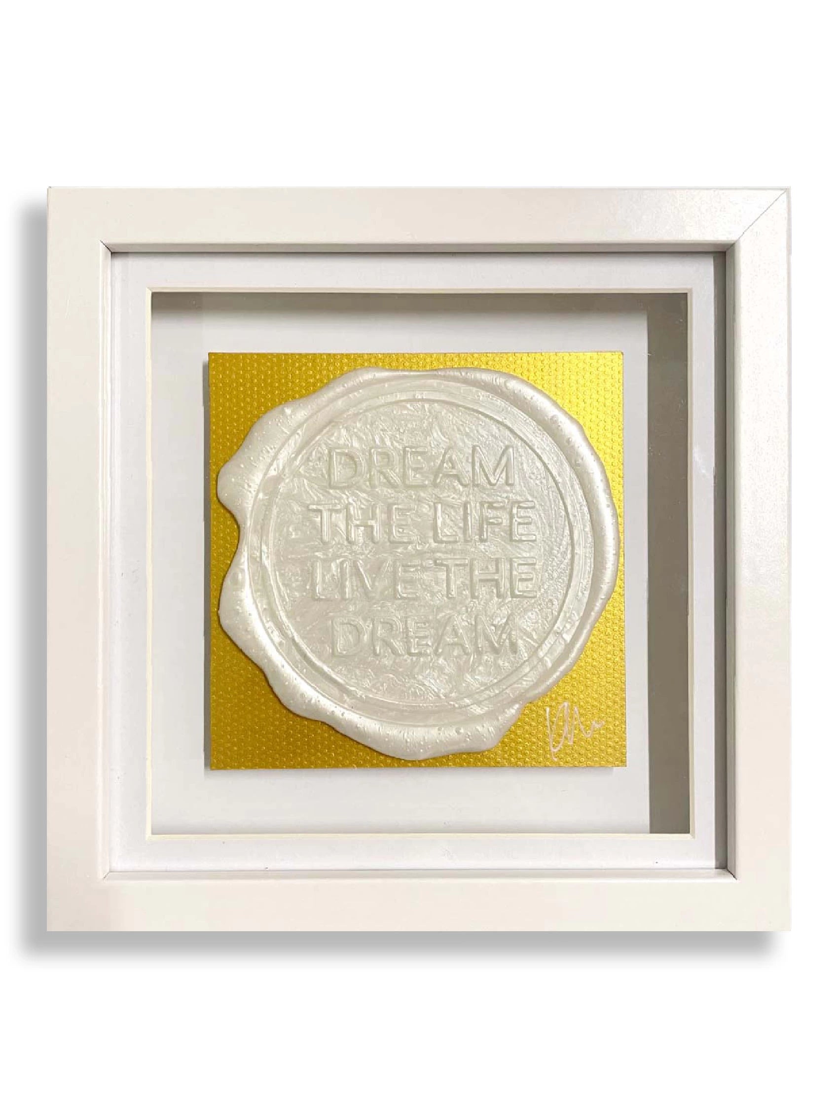 The "Sealed Intention to Live The Dream" by Kate Mayer is a framed original art piece with a bespoke wax seal impression inscribed "Dream the Life Live the Dream" on a yellow background, signed by the artist.