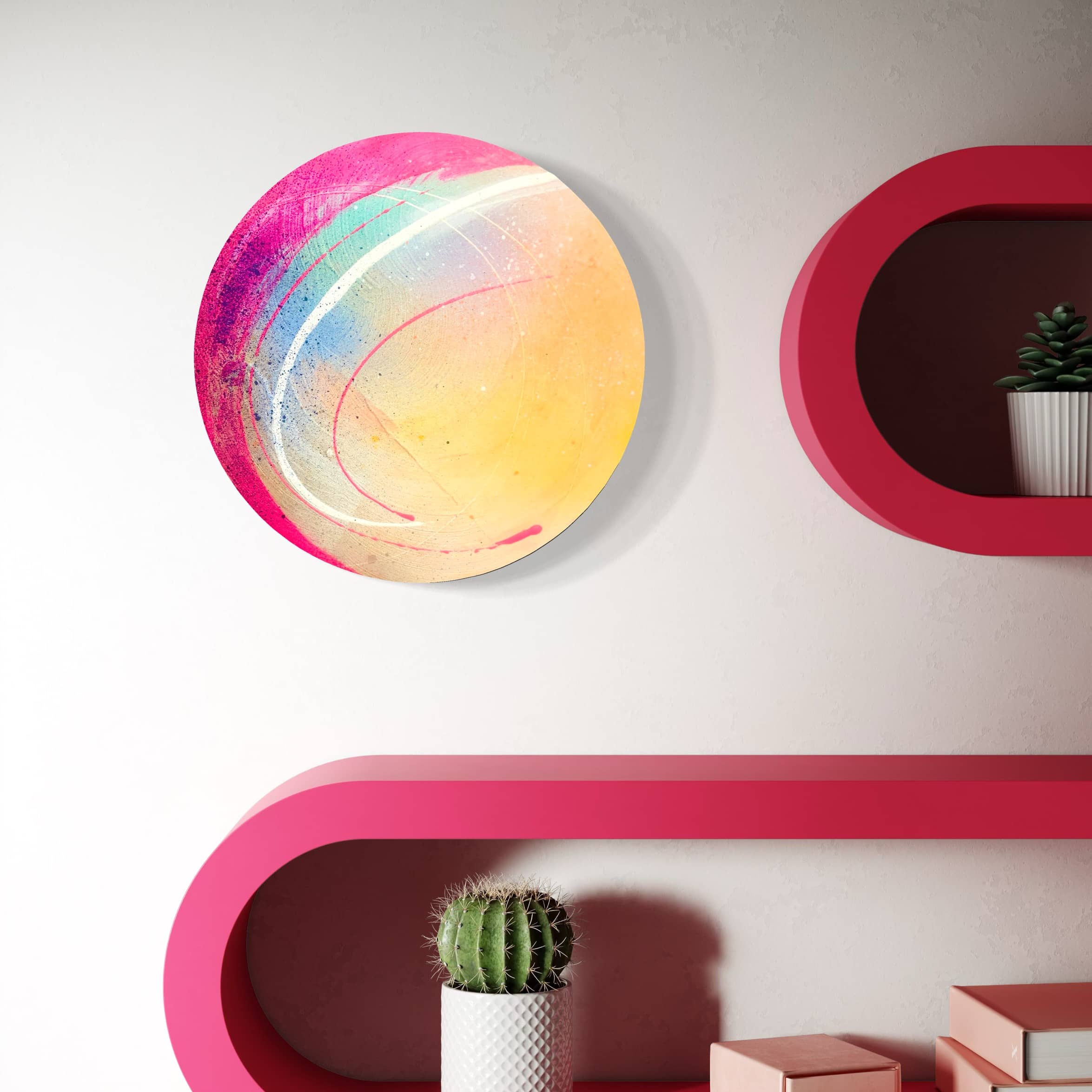 Kate Mayer's "Be Colourful" painting hangs above red shelves with potted cacti.