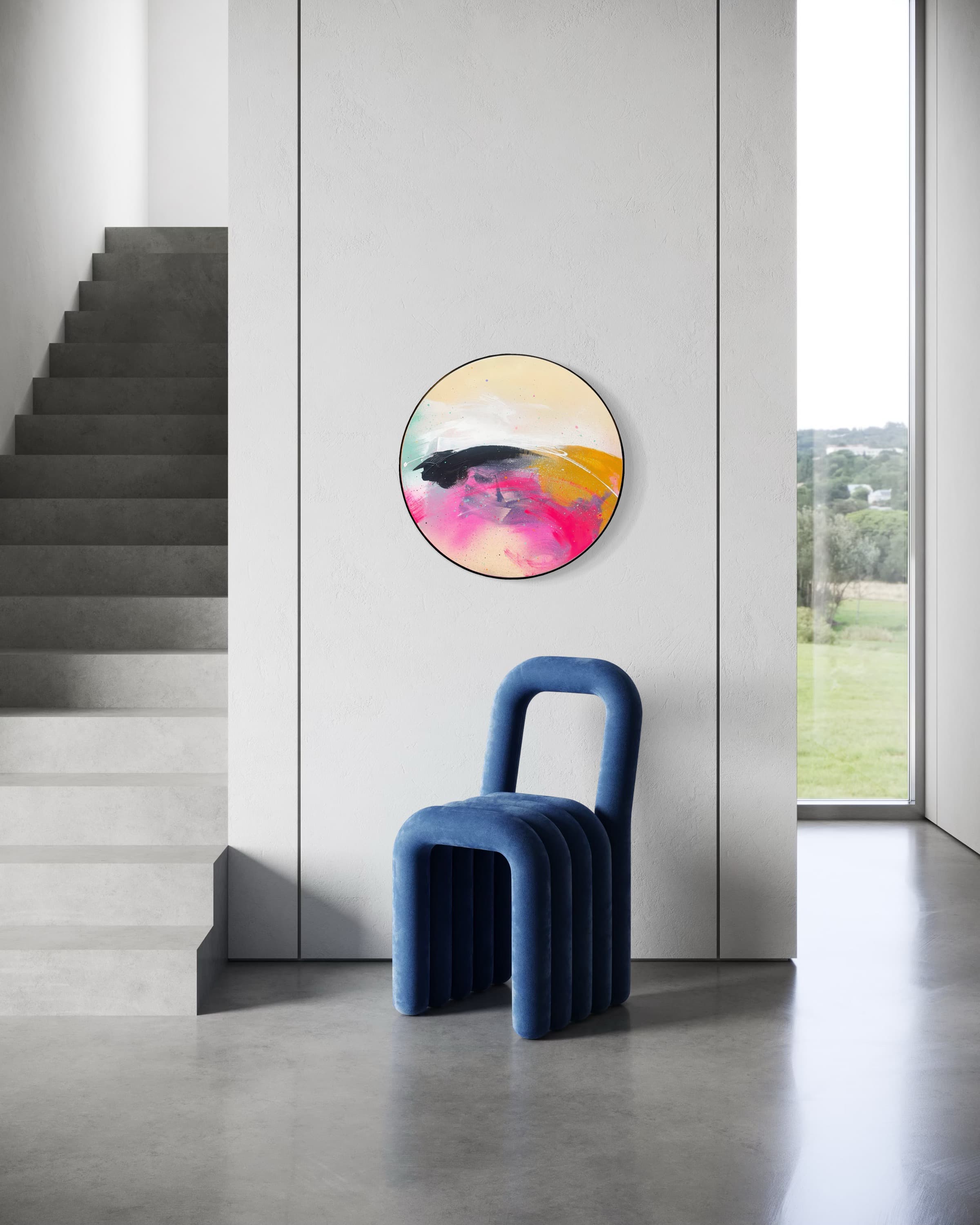 Modern minimalist room with the Move On Up chair by Kate Mayer and a tall window with a scenic view.
