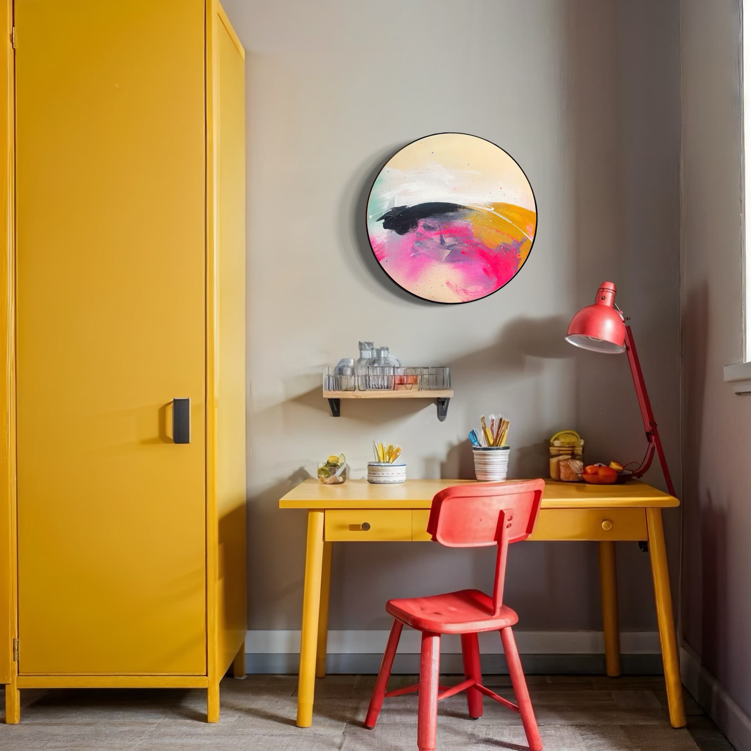 A yellow desk and wardrobe with a red chair beneath "Move On Up" by Kate Mayer on a gray wall.
