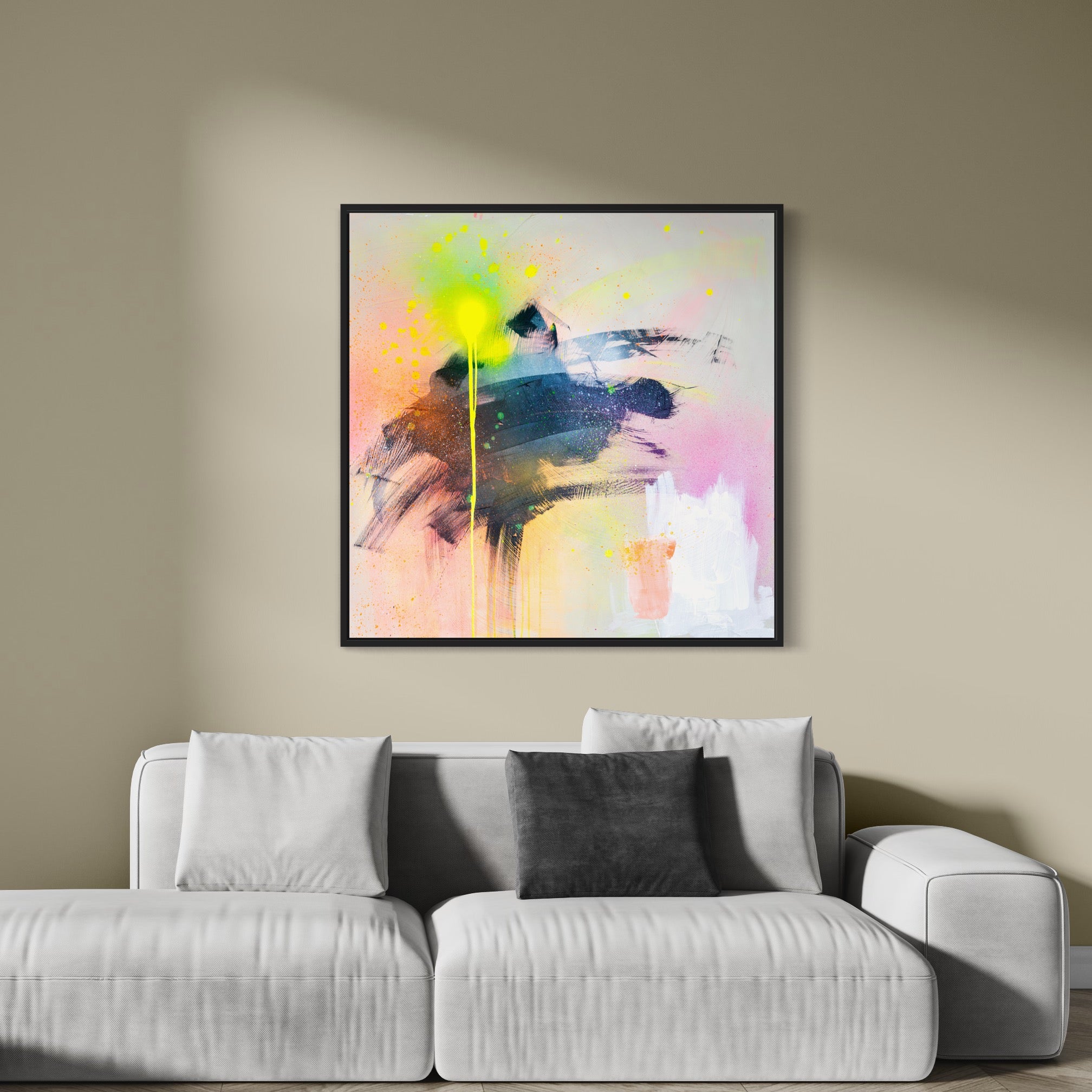 The Miami Vibes original painting by Kate Mayer adds a modern art vibe to the beige wall above the light gray sofa with its bold brush strokes and splashes of neon colors.