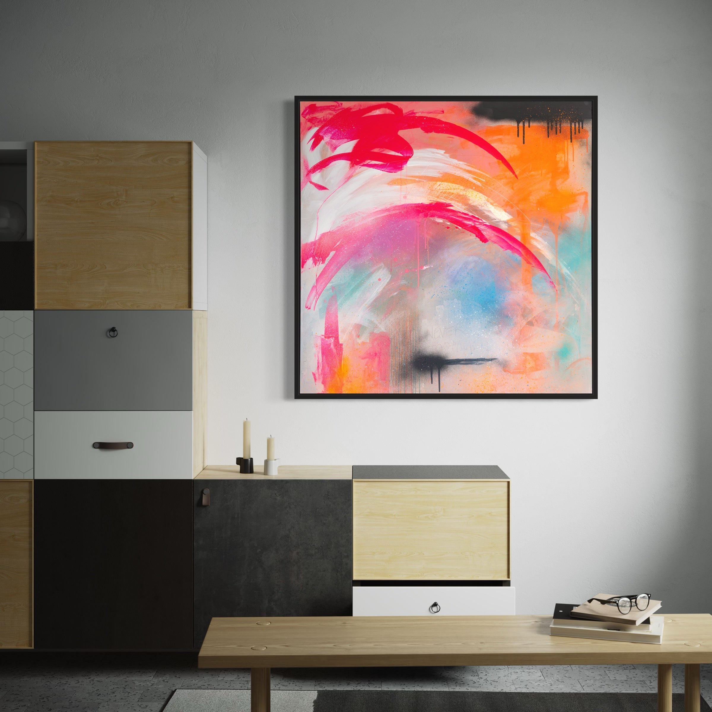 Featuring "Never Too Much," an original painting by Kate Mayer, this piece showcases colorful acrylic and spray paint abstract art with pink and orange brushstrokes adorning the wall. Nearby, modern wooden furniture complements Kate Mayer's vibrant style.