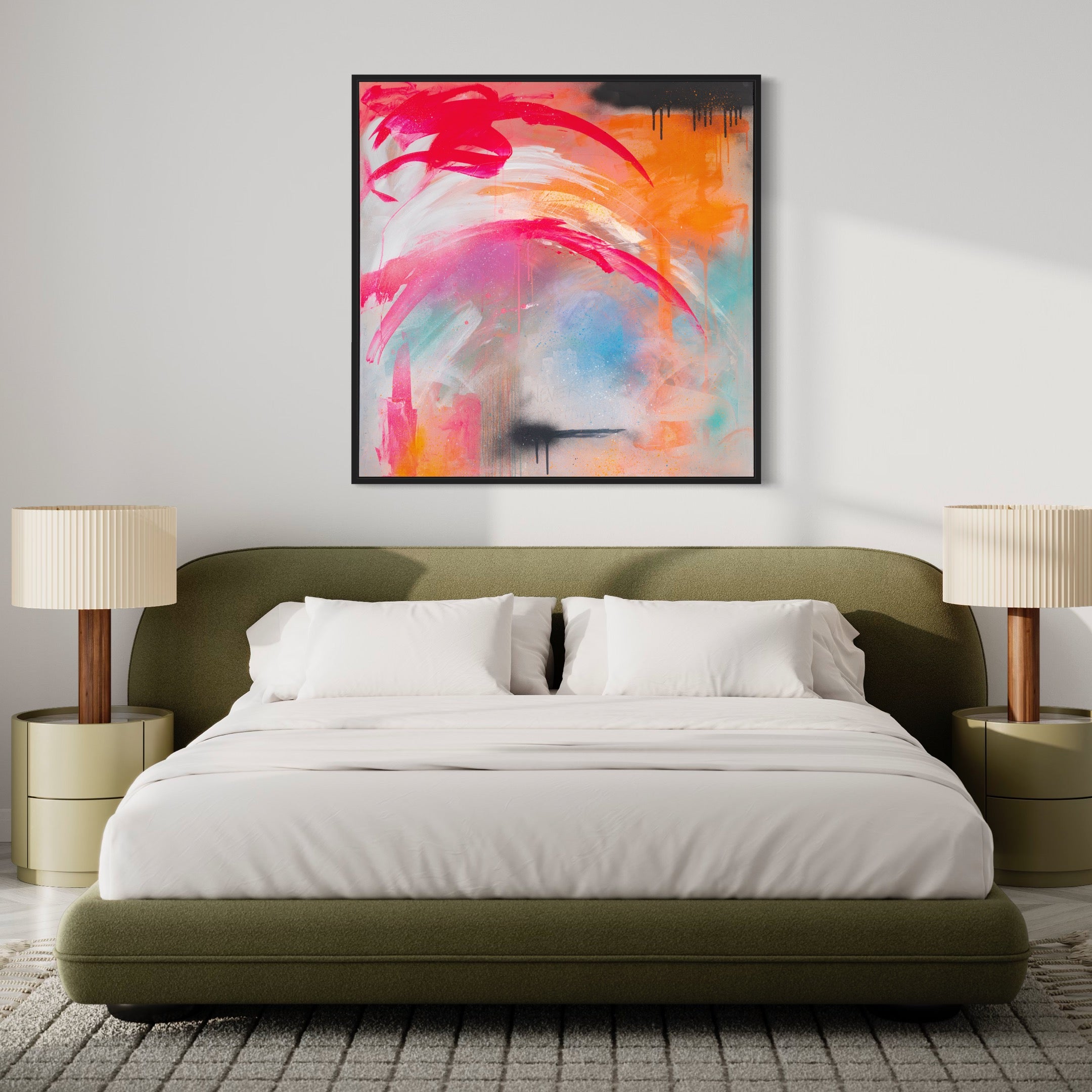A bedroom features a green bed with white bedding and two nightstands. The wall is adorned with "Never Too Much," an original painting by Kate Mayer, created using acrylic and spray paint.