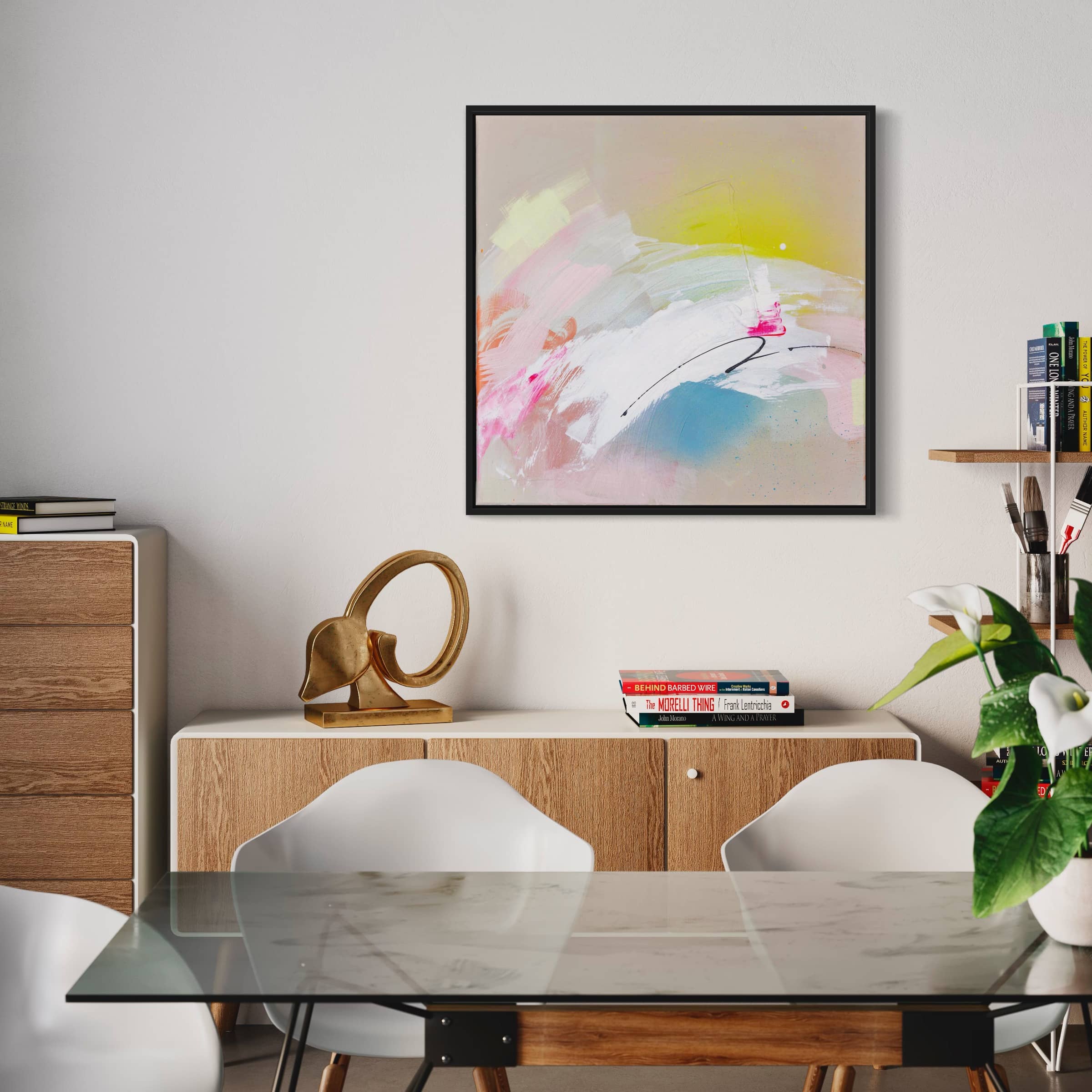 A contemporary dining room showcasing the "Miami Beach" original painting by Kate Mayer on the wall, enhanced by a glass table, white chairs, and decorative items on a wooden sideboard.
