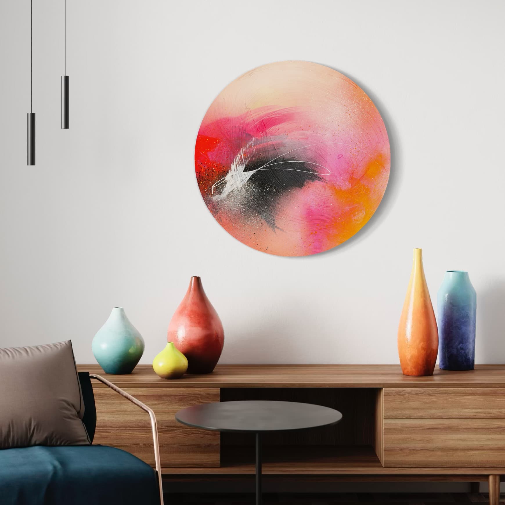 Kate Mayer's "Set The World On Fire" painting decorates a wall above vases, next to a modern sofa.
