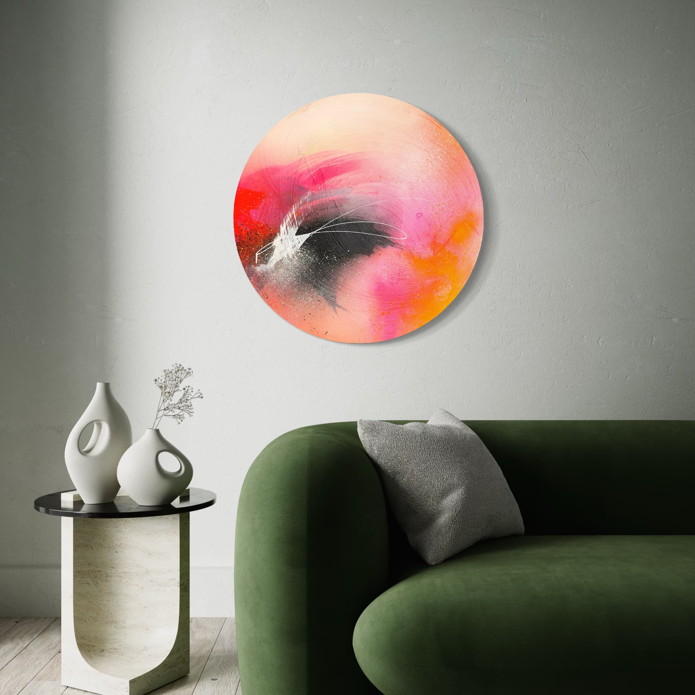 Set The World On Fire" by Kate Mayer hangs on a gray wall above a green sofa and vases on a small table.