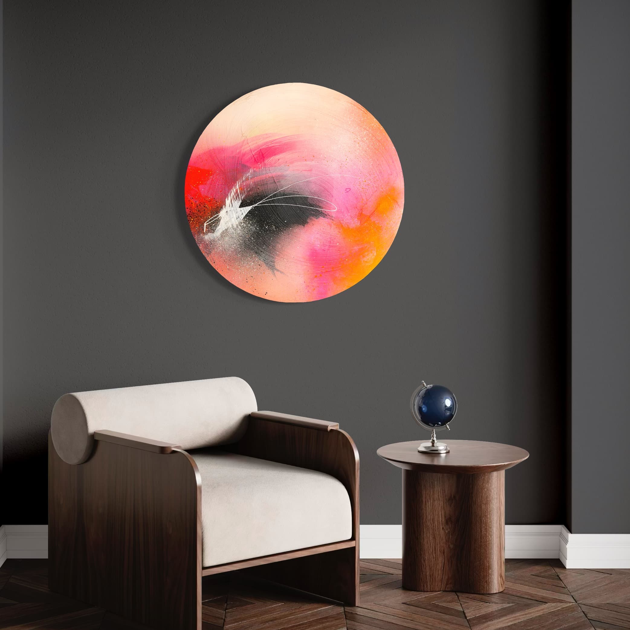 Modern room with a beige armchair, a table with a globe, and Kate Mayer's "Set The World On Fire" painting on a dark wall.