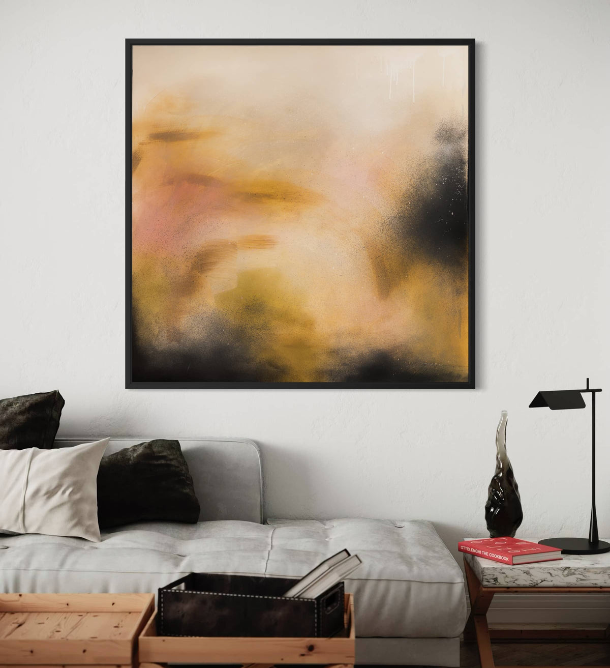 The acrylic "Everything In Its Right Place" by Kate Mayer hangs above a gray sofa in a stylish living room.