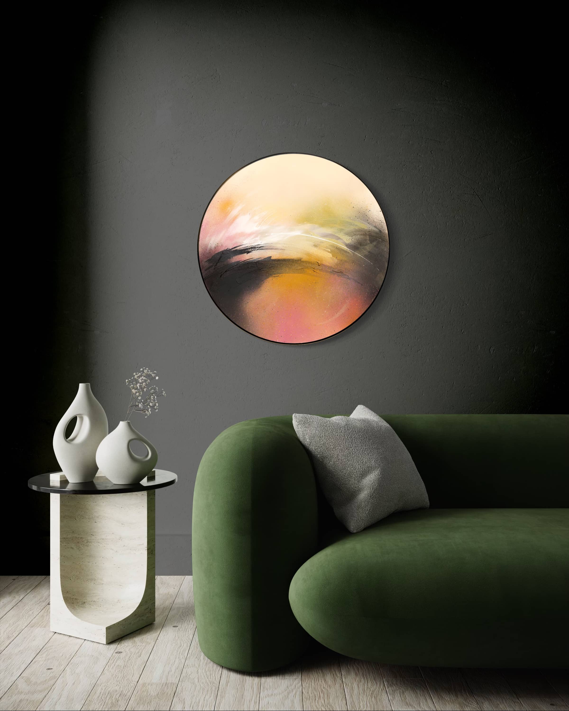 Modern living room with green velvet sofa, side table, and Kate Mayer's "One Day Like This" art on a dark wall.
