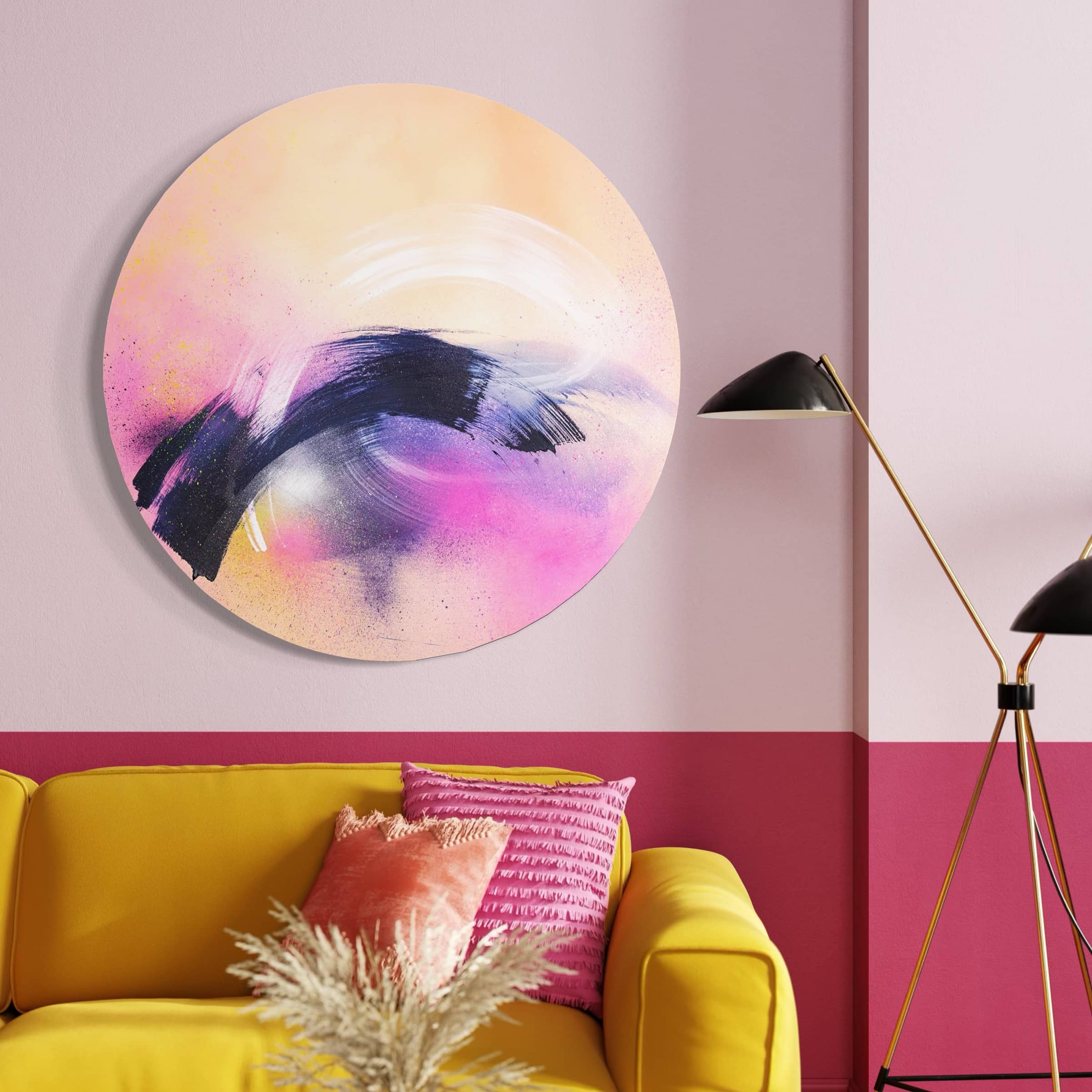 A cozy room with a yellow couch, pink cushion, and Breathe In The Air by Kate Mayer in a handmade metal float frame.