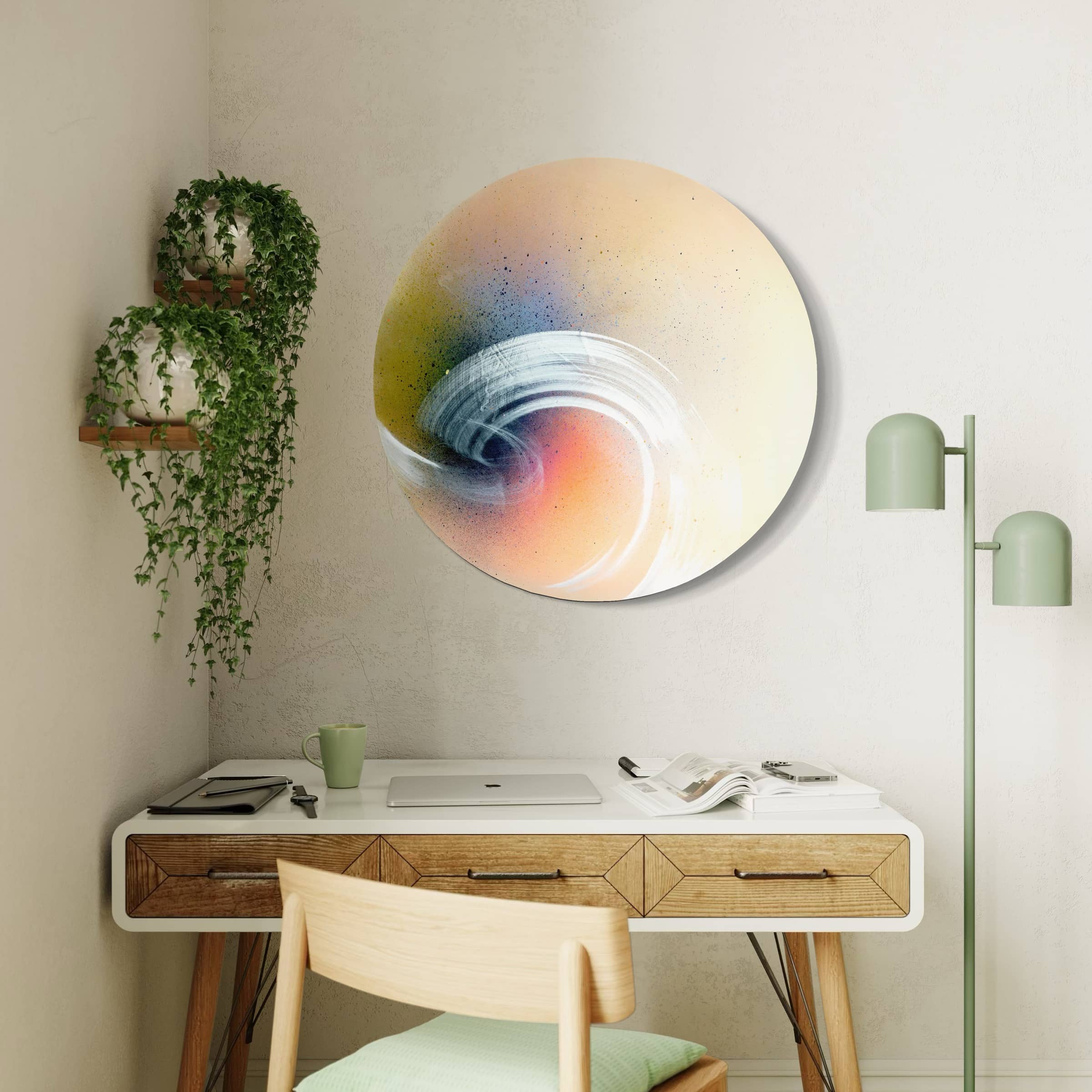 Minimalist workspace with a wooden desk, green lamp, painting "From Here To Infinity" by Kate Mayer, and plants on shelves.
