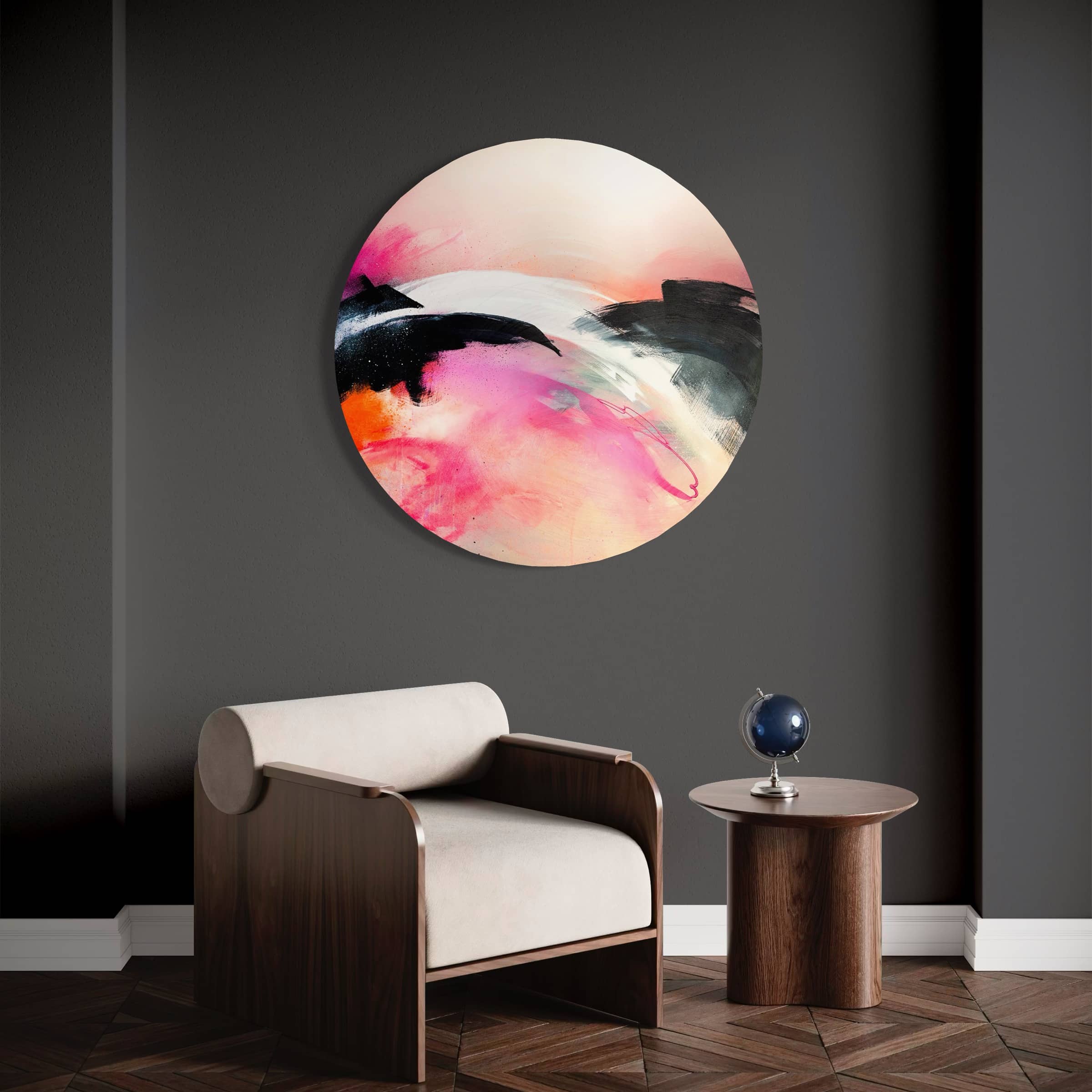Kate Mayer's "It's A New Dawn" painting in a custom metal frame is displayed above a modern chair and round table.