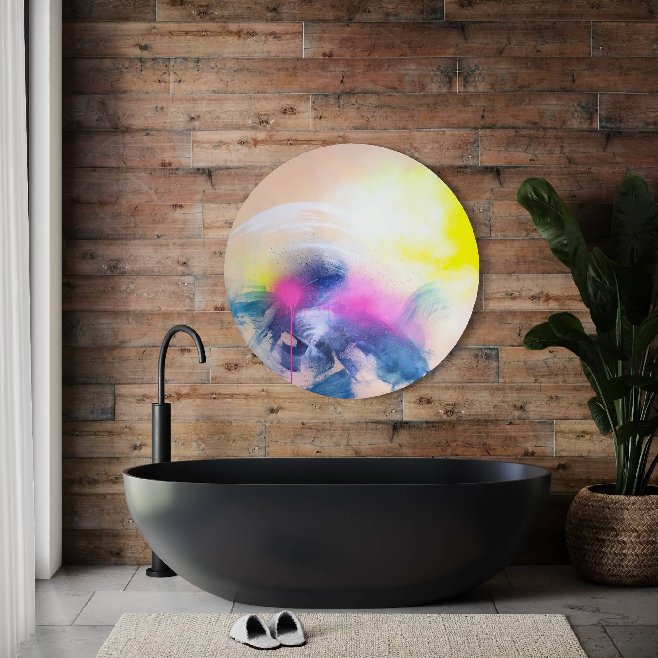 Modern bathroom features a dark oval tub, Rolling In The Deep painting by Kate Mayer, and a large plant against wood wall.
