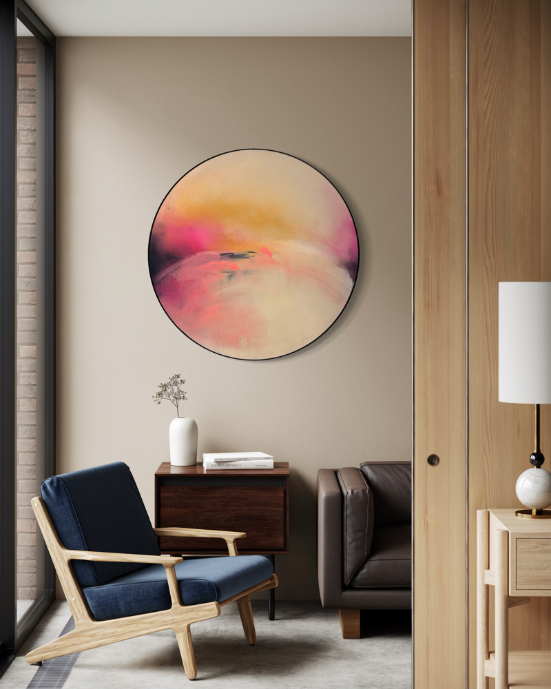Modern living room featuring “Unfinished Sympathy” by Kate Mayer in a handmade metal float frame, blue chair, and sofa.