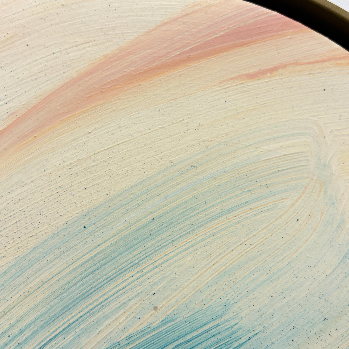 Don’t You Ever Give Up“ by Kate Mayer features pastel swirls in a handmade metal float frame for modern elegance.