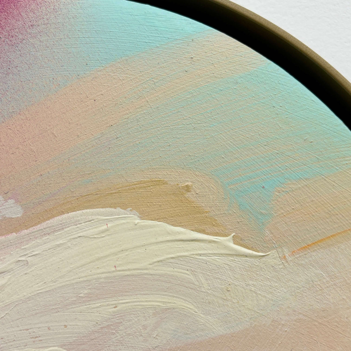 I Smile“ by Kate Mayer: pastel abstract with textured brushstrokes in cream, blue & pink on round acrylic plywood.