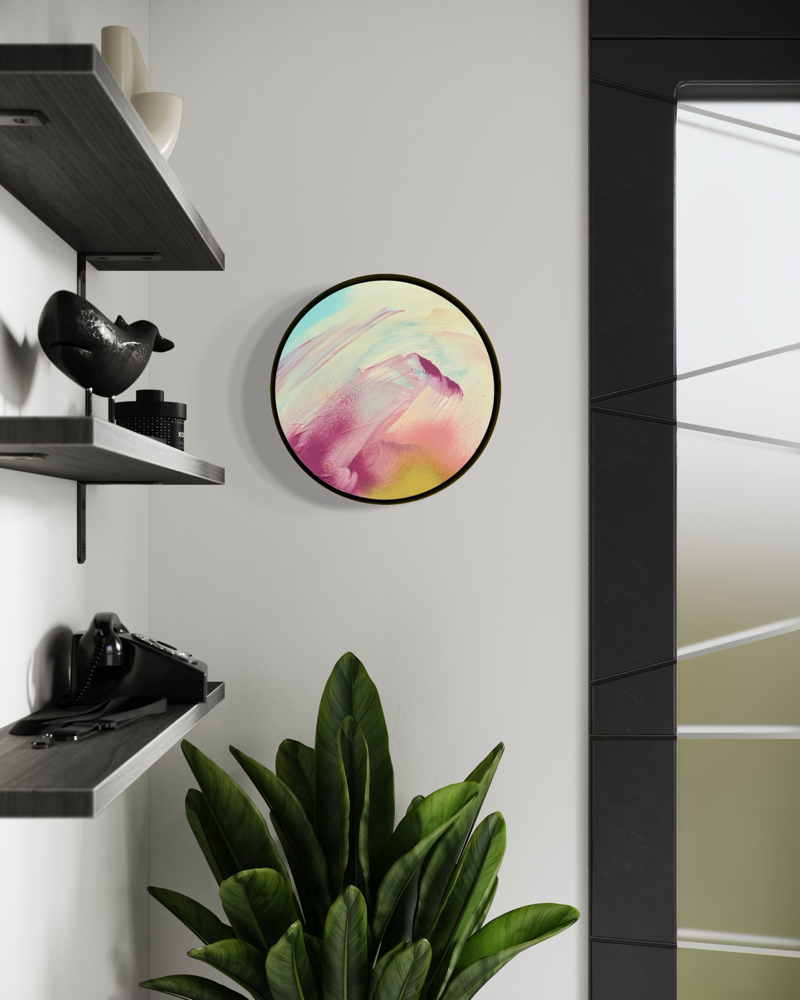 The Power Of One by Kate Mayer: round abstract in soft pastels, framed in metal, floats above shelves and greenery.