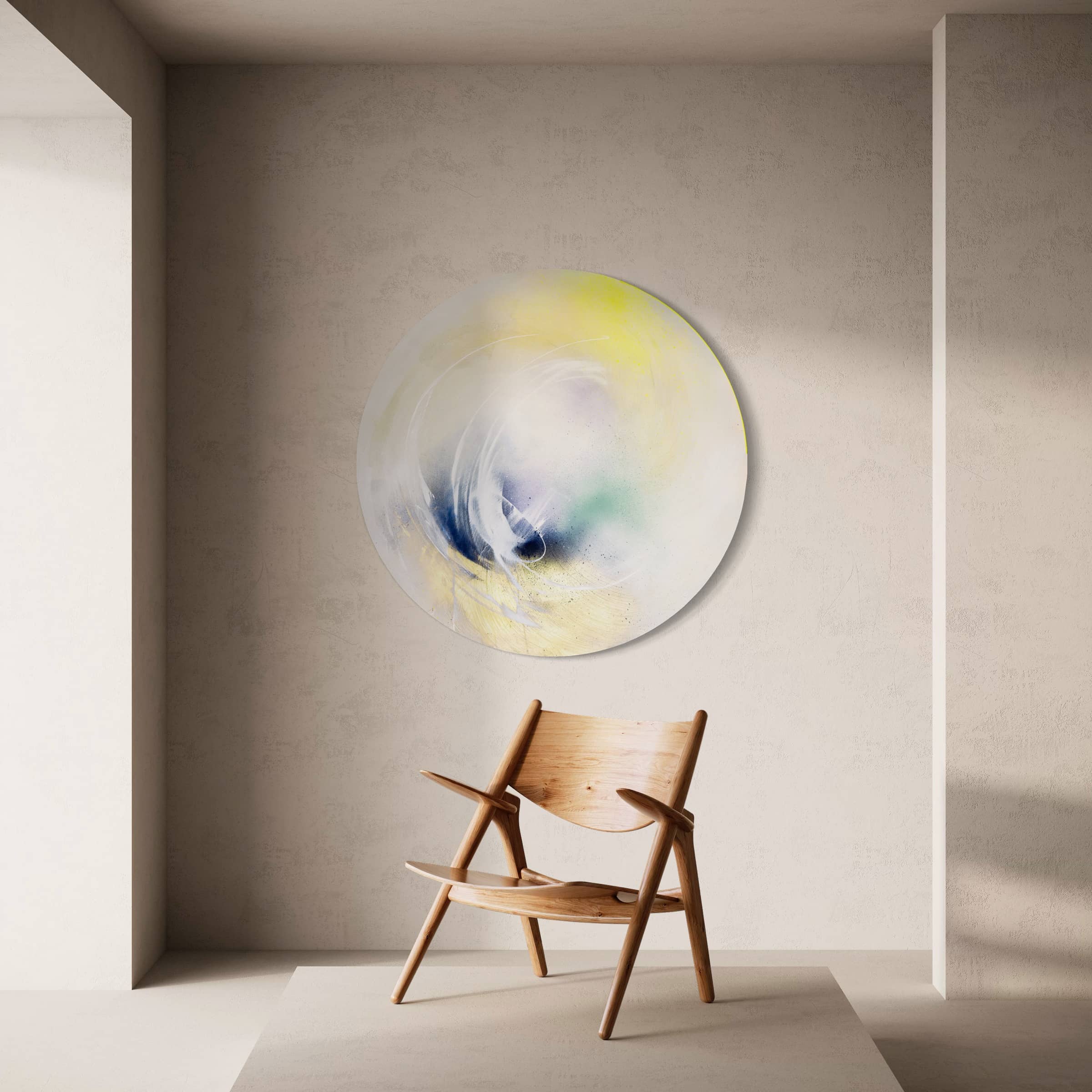 A wooden chair sits in a minimalist room, complemented by Kate Mayer's original artwork titled "Let's Make This Moment Last," an abstract painting in soft colors, artfully rendered with acrylic and spray paint, hanging on the wall.