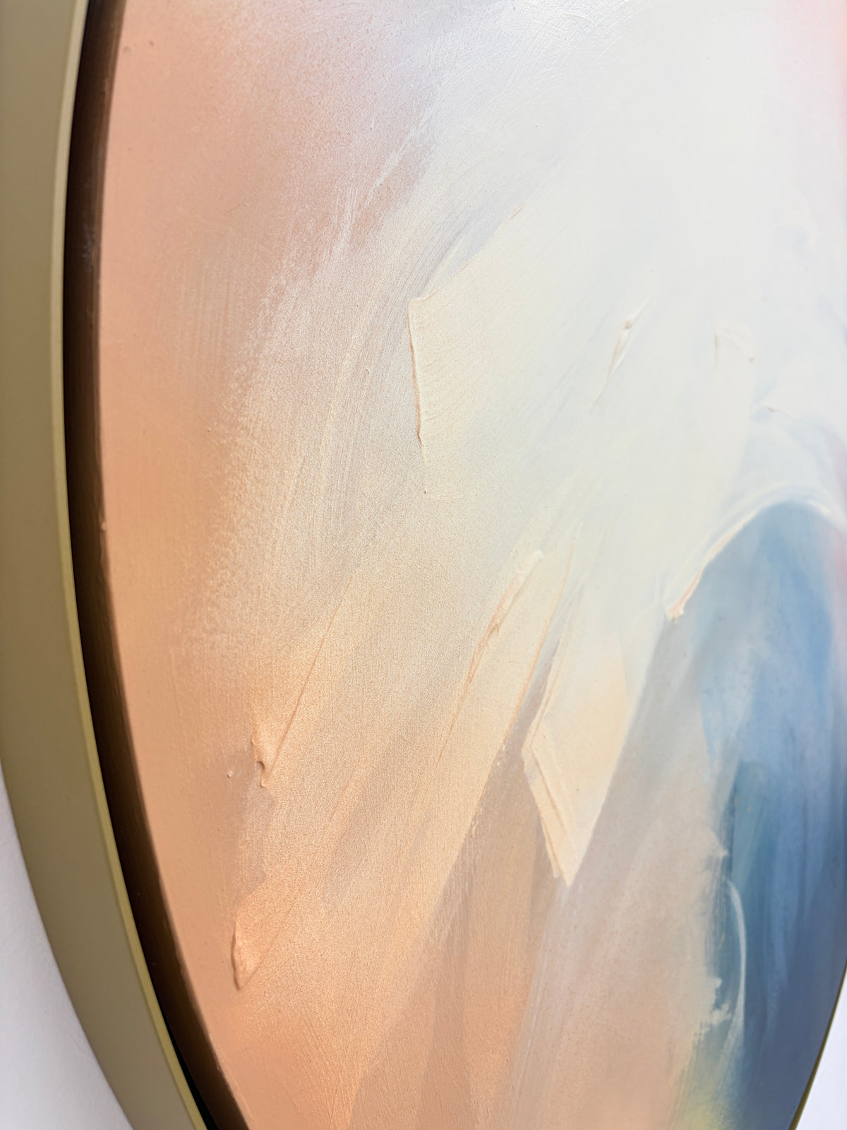 Close-up of “Total Praise” by Kate Mayer—abstract peach, white & blue acrylic on plywood and round canvas.