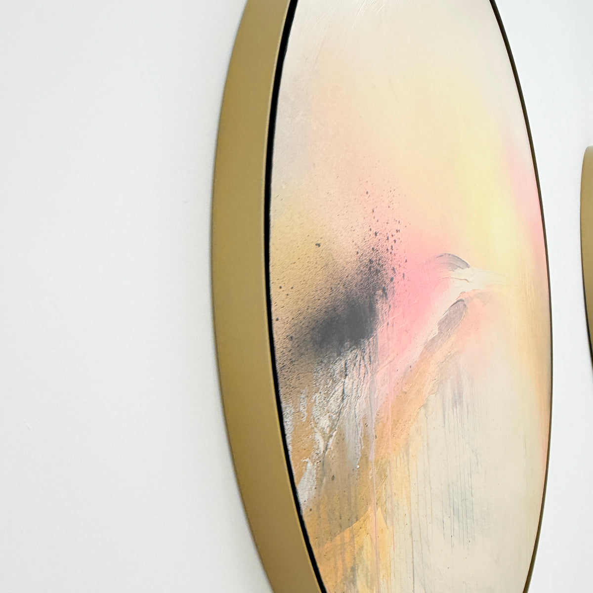 Shadows“ by Kate Mayer: Oval acrylic on plywood with pastel and black details, framed in handmade metal, displayed on white.