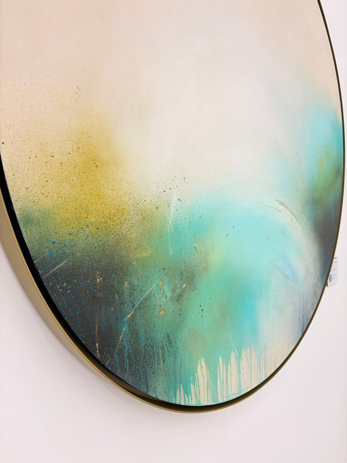 The Afterglow of Stillness by Kate Mayer: circular abstract in yellow, green, blue acrylic on white plywood.