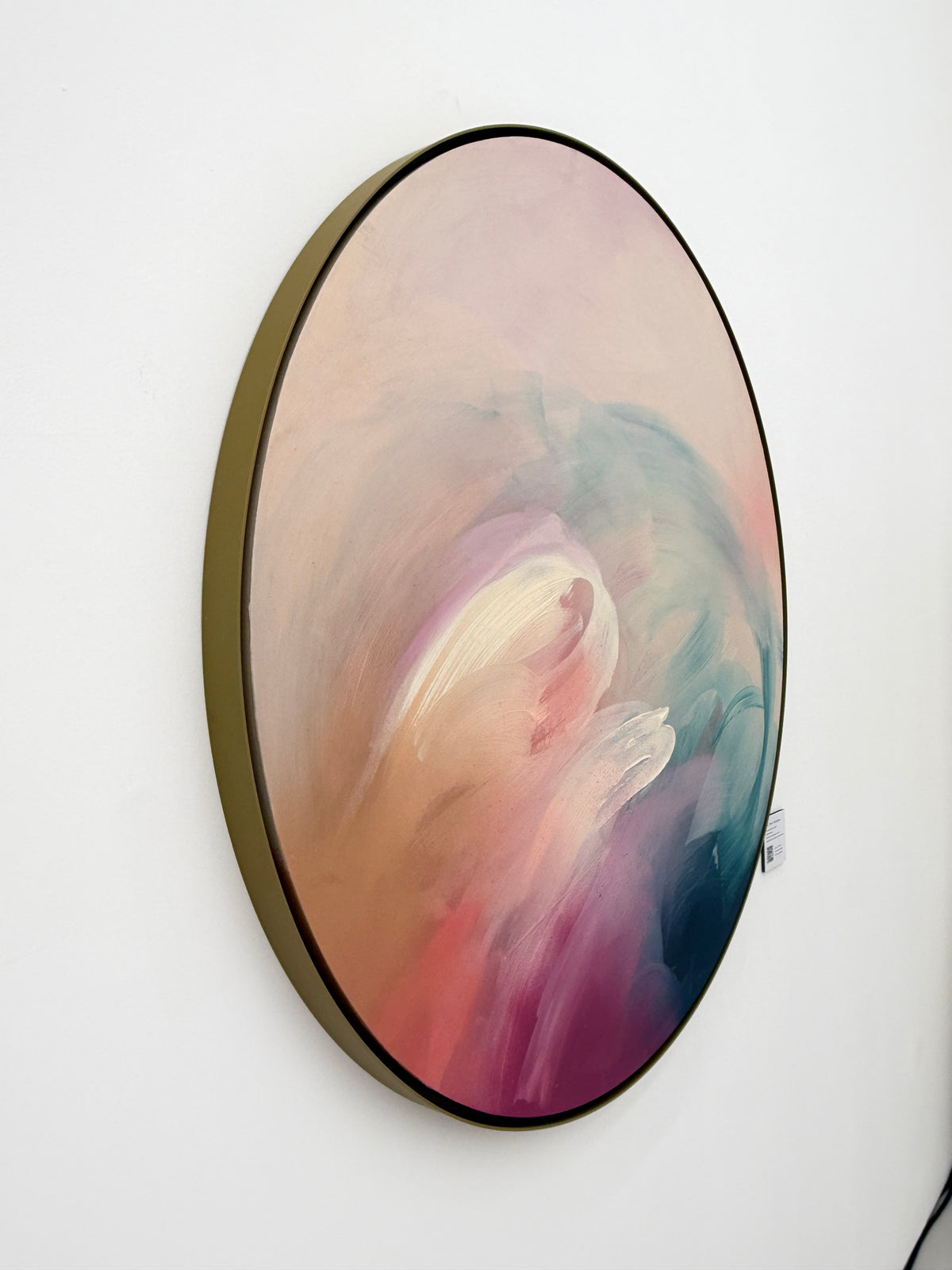 For Every Mountain“ by Kate Mayer: oval pastel acrylic painting on plywood, framed in handmade metal, wall-mounted.