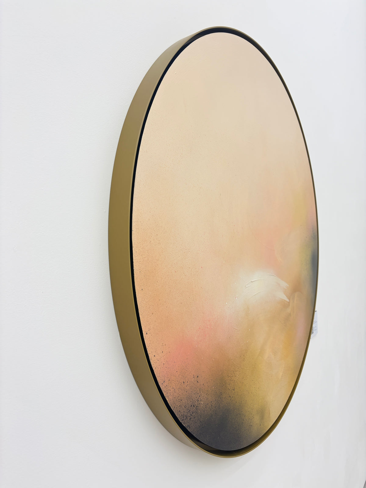 ‘Friend’ by Kate Mayer: round abstract painting in peach, pink, and black tones with a handmade metal float frame.
