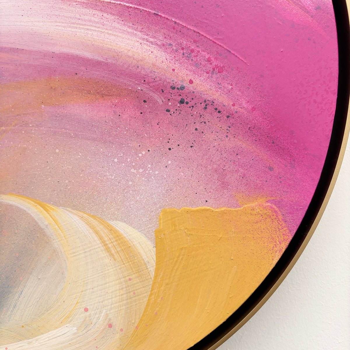 Love’s In Need Of Love Today“ by Kate Mayer: Abstract round canvas with swirling pink, yellow & white acrylic.