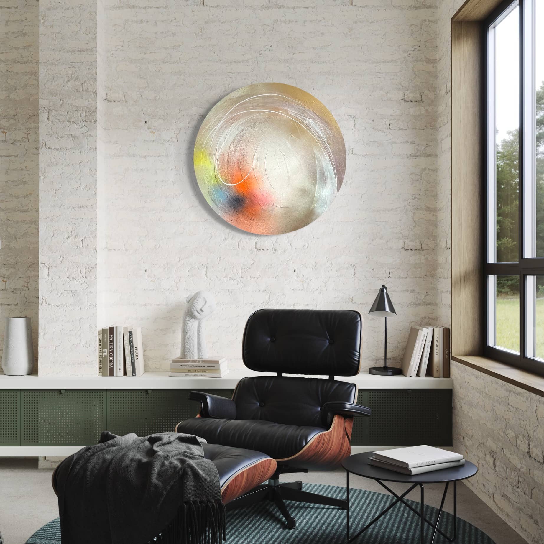 A modern living room featuring a black lounge chair, a small round table, an original painting by Kate Mayer titled "The Time Is Now," which incorporates acrylic diamond dust, and a window with greenery outside.