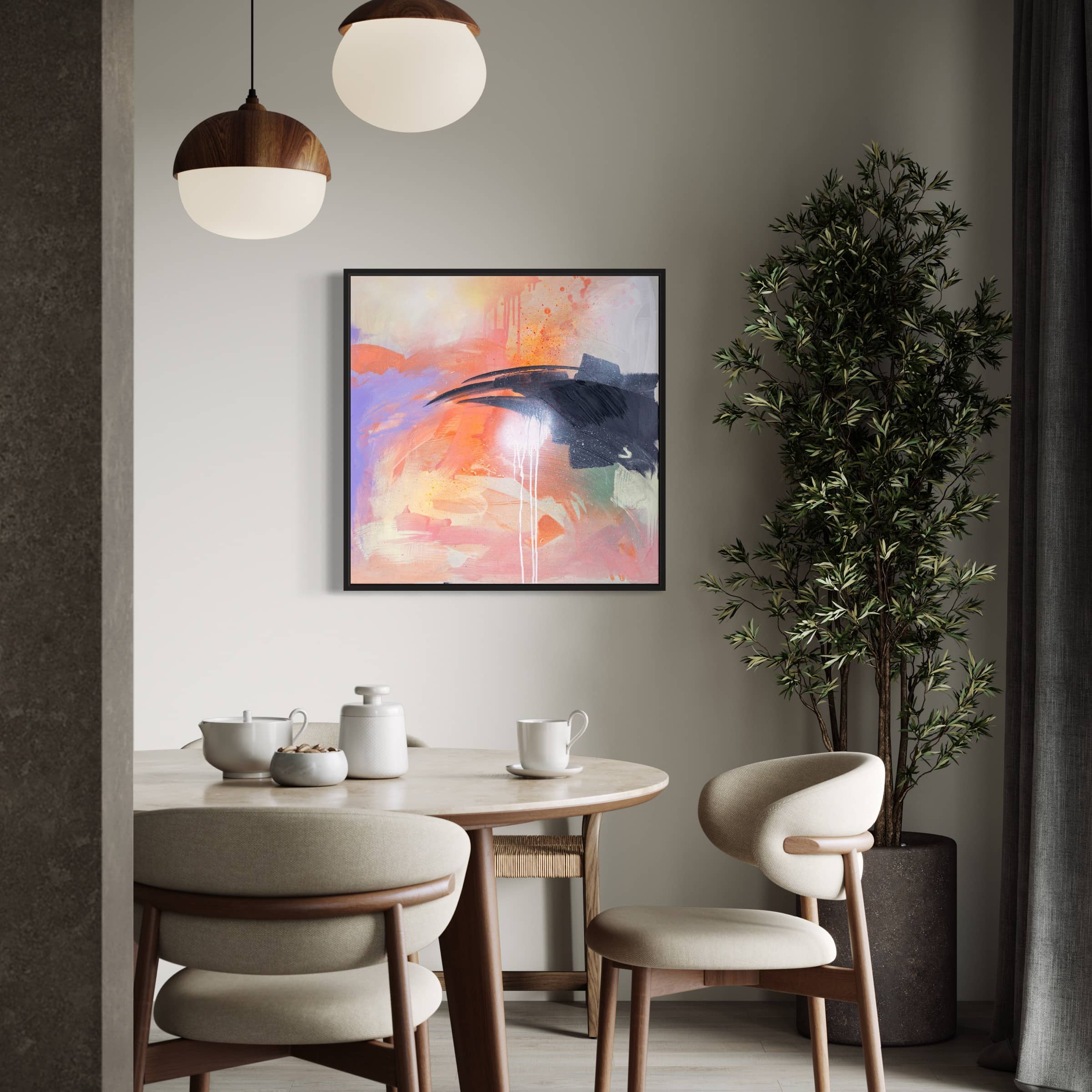 Minimalist dining area with a round table, chairs, "Beneath The Surface" original painting by Kate Mayer on the wall, and a potted plant nearby.