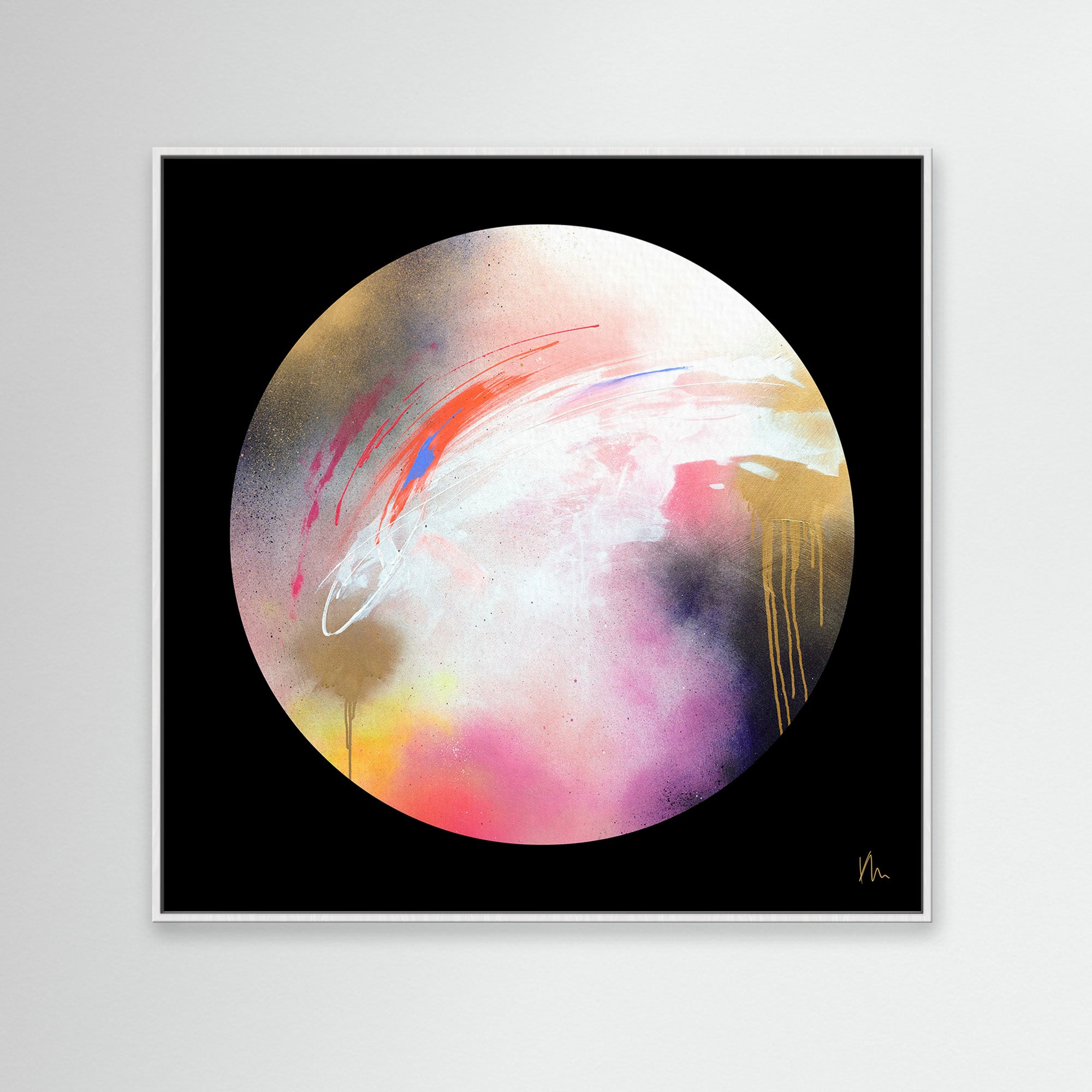 The Dream Starts Here" by Kate Mayer features an abstract circular composition with splashes of pink, yellow, and gold on a black background, beautifully framed in a white border. This vibrant piece captures the essence of modern creativity with its bold color palette.