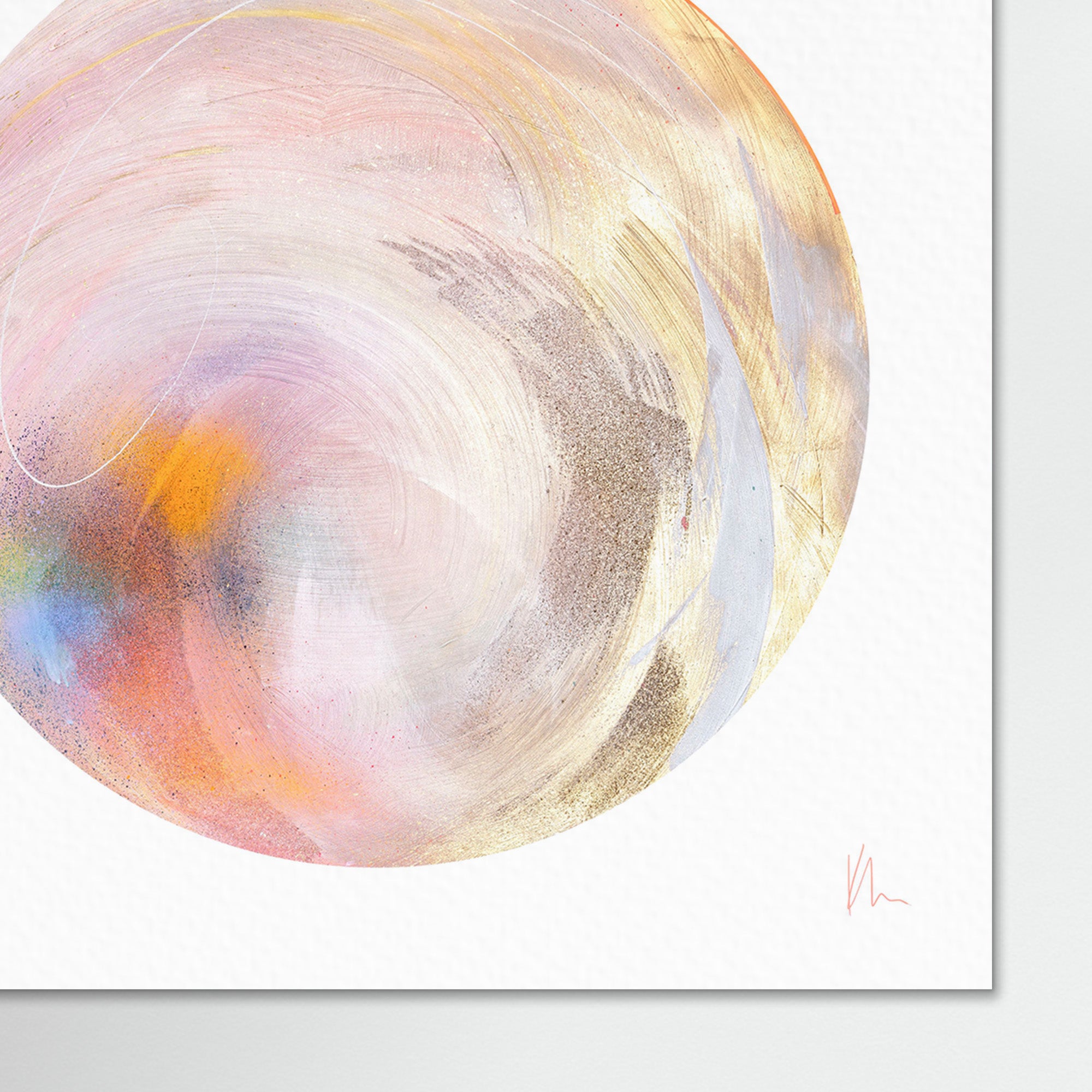 The "Believe In Me" artwork by Kate Mayer is an abstract painting featuring swirling pastel colors like pink, orange, and metallic gold spray paint, forming a dynamic circular pattern on a white background. Subtle hints of diamond dust add a touch of sparkle, making this piece truly captivating.