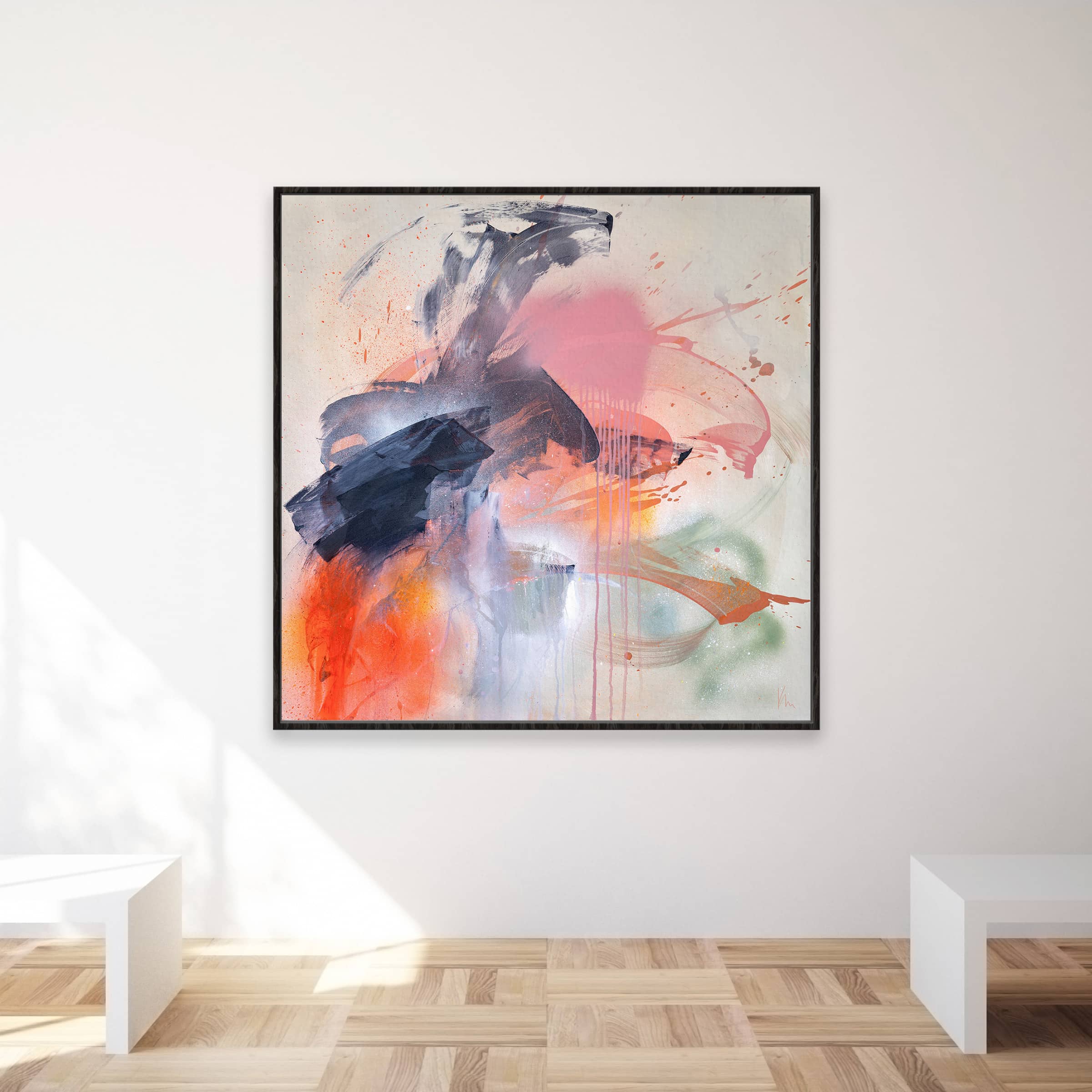 Kate Mayer's 'Fire And Ice', an abstract masterpiece featuring dynamic contrasts with splashes of blue, orange, pink, and hints of green, hangs on a white wall in a well-lit room.