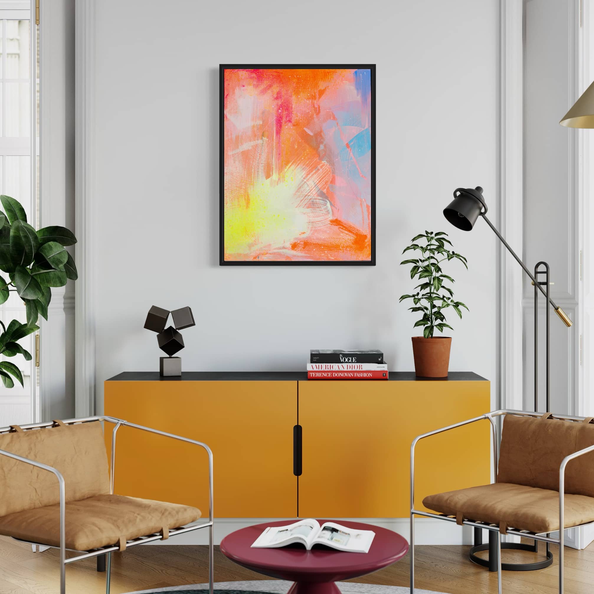 Modern living room featuring the 'Dream Big' original painting by Kate Mayer, highlighted by a yellow cabinet, lush plants, and stylish furniture.