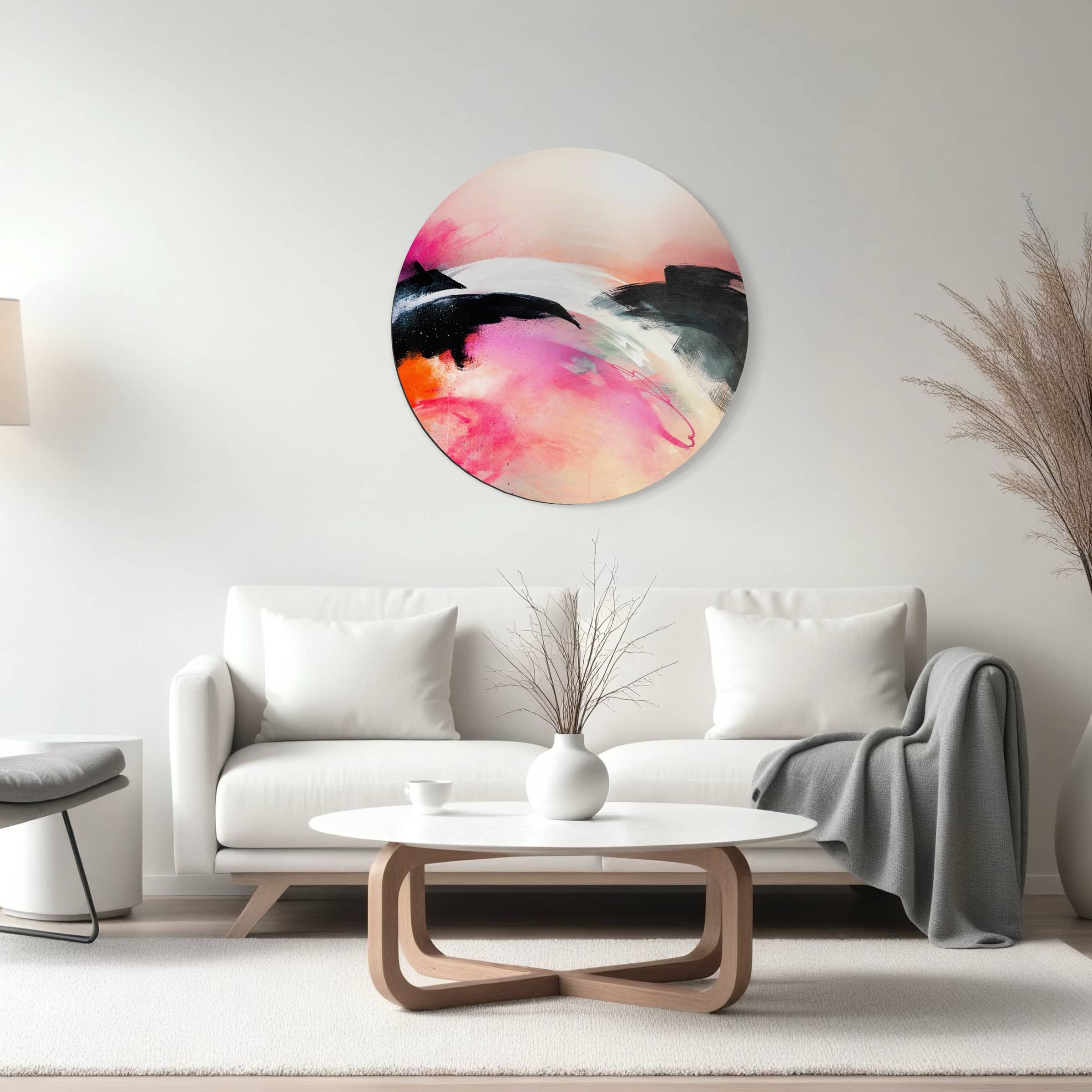 Modern living room with white furniture, Kate Mayer's "It's A New Dawn" painting in a bespoke frame, and a vase on a round table.