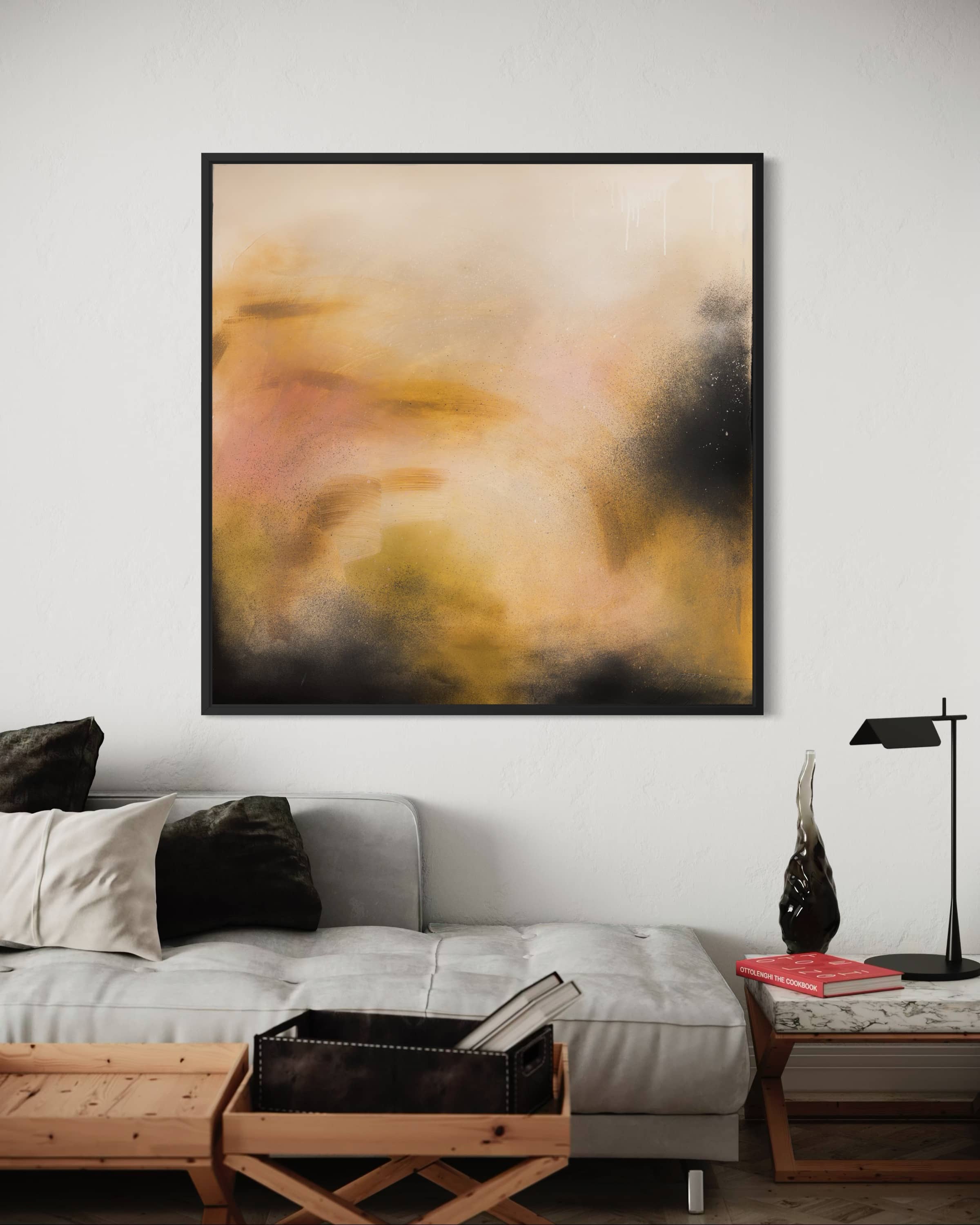 The acrylic "Everything In Its Right Place" by Kate Mayer hangs above a gray sofa in a stylish living room.