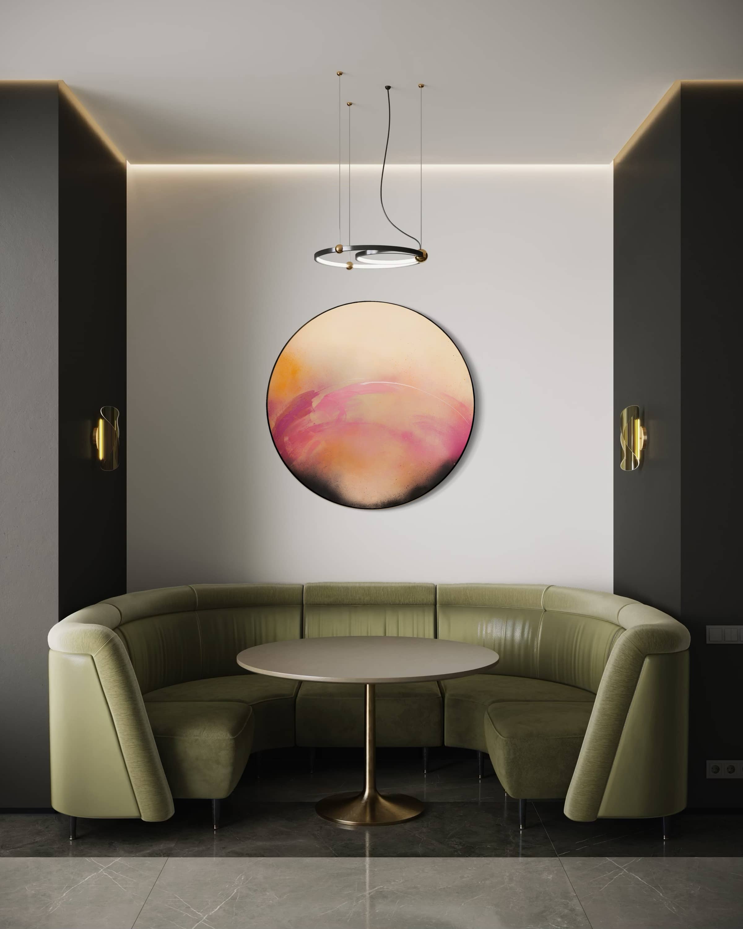 Modern nook with round olive-green sofa, circular table, Kate Mayer’s "I Wait With Good Intentions," and gray walls.