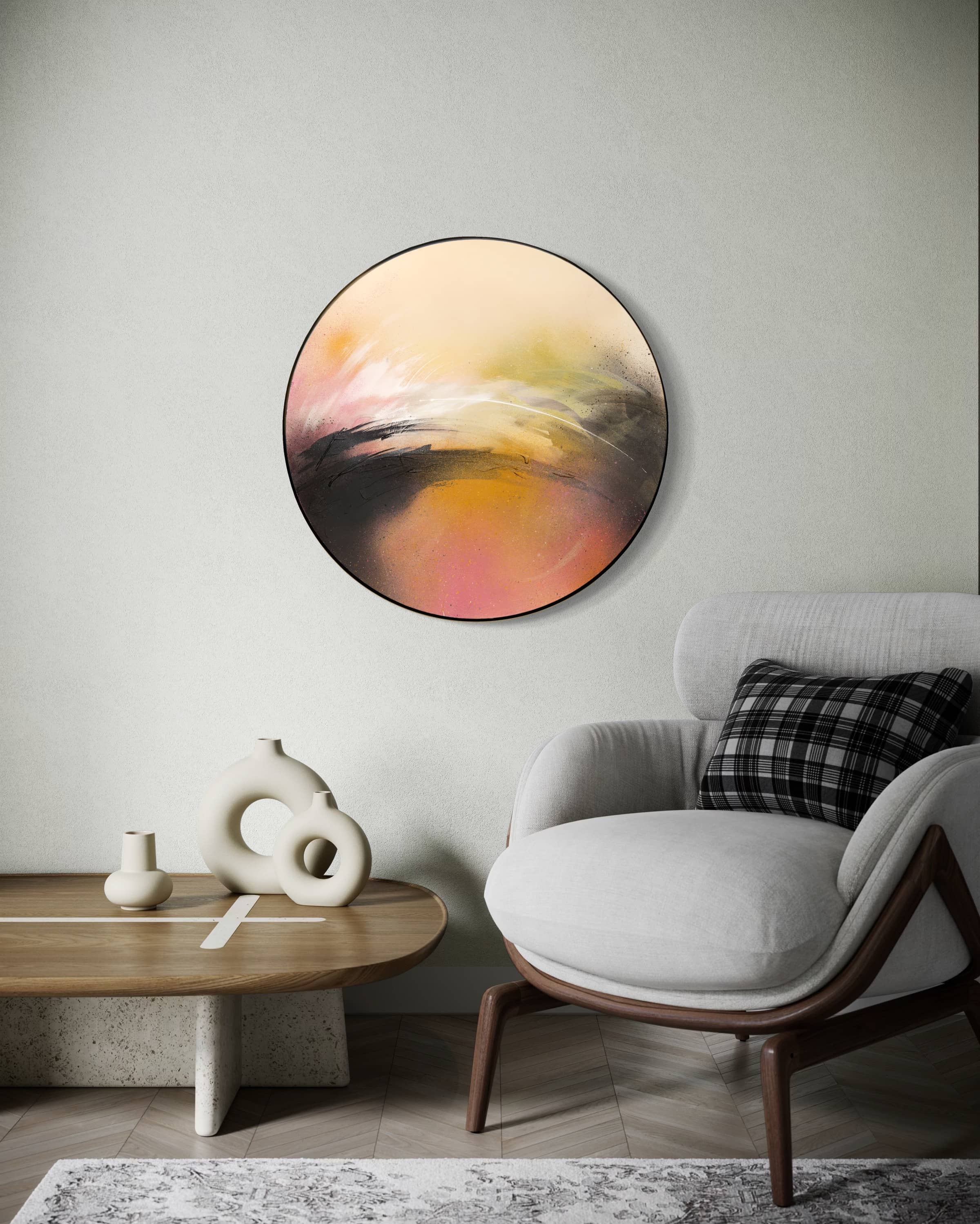 A cozy modern chair and table sit by a wall with Kate Mayer’s "One Day Like This" painting above.