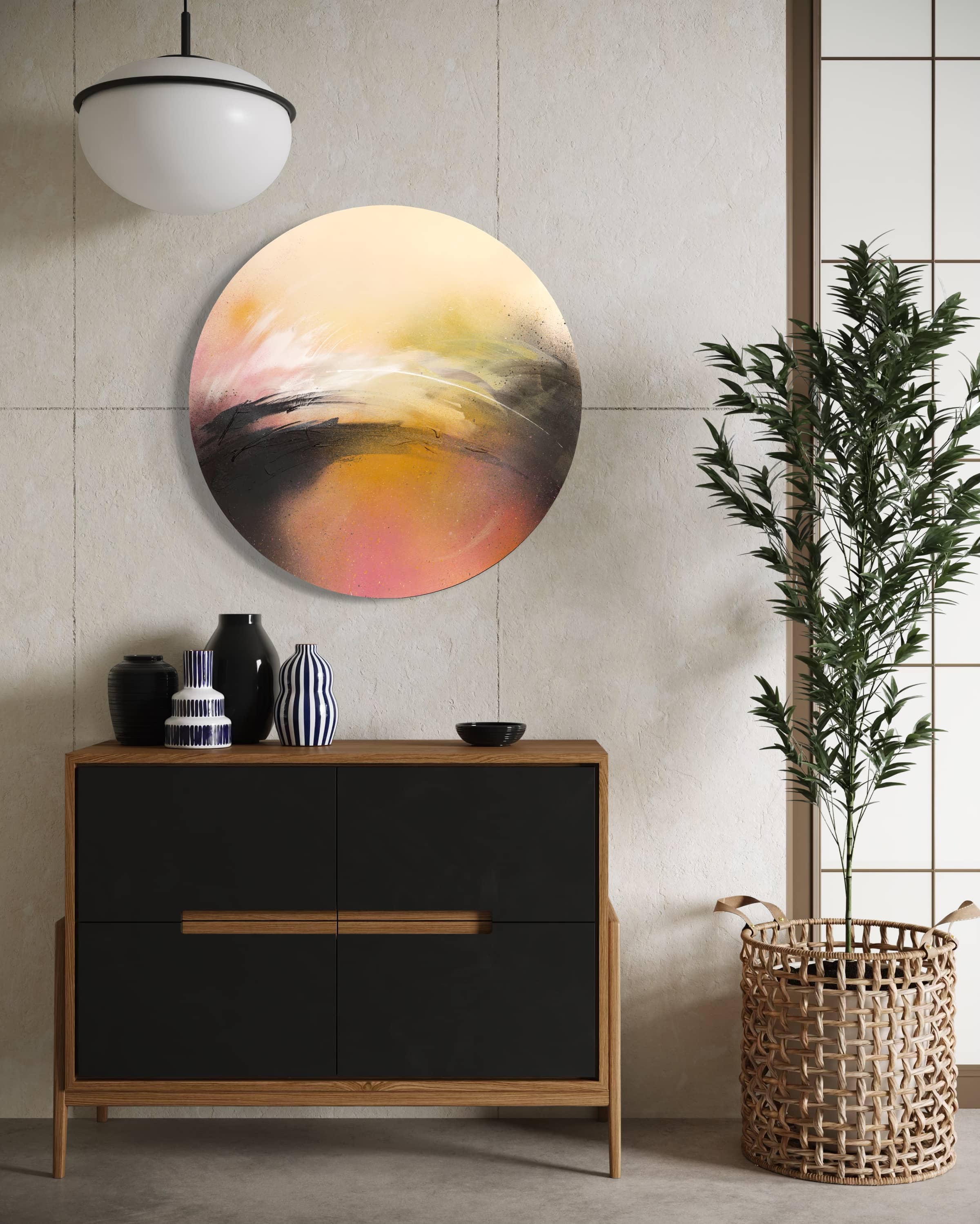 A modern interior with Kate Mayer's "One Day Like This" painting, black cabinet, vases, and a plant in a woven basket.