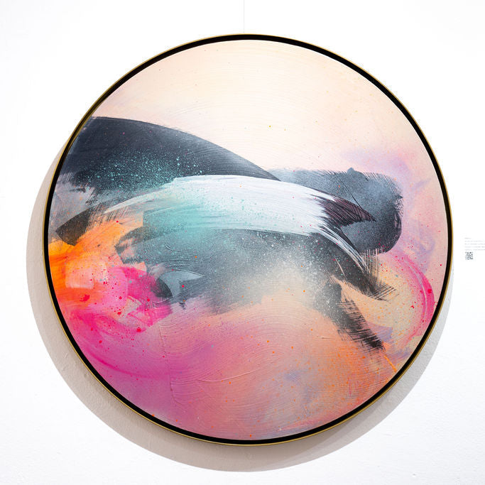 vibrant, circular abstract painting in shades of pink and orange with handmade float frame