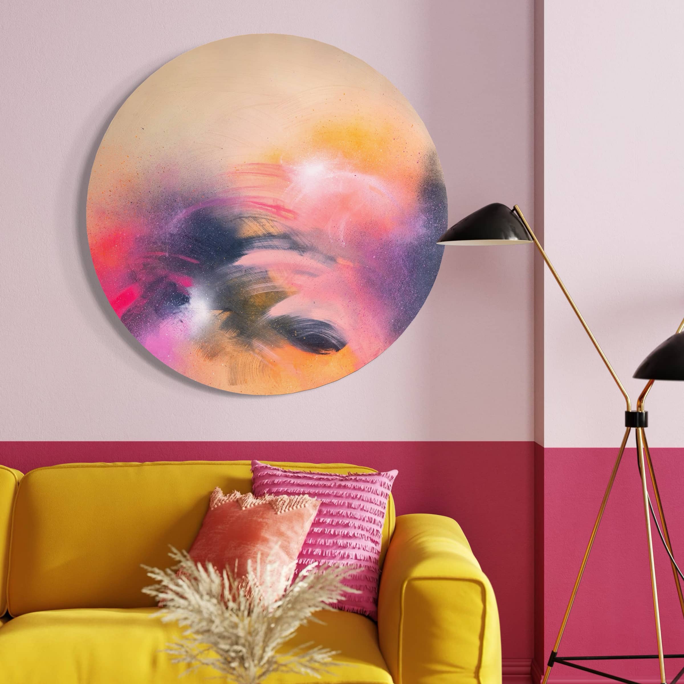 Kate Mayer's "A Star is Born" painting decorates a pink wall above a yellow sofa with a pink pillow and floor lamp.
