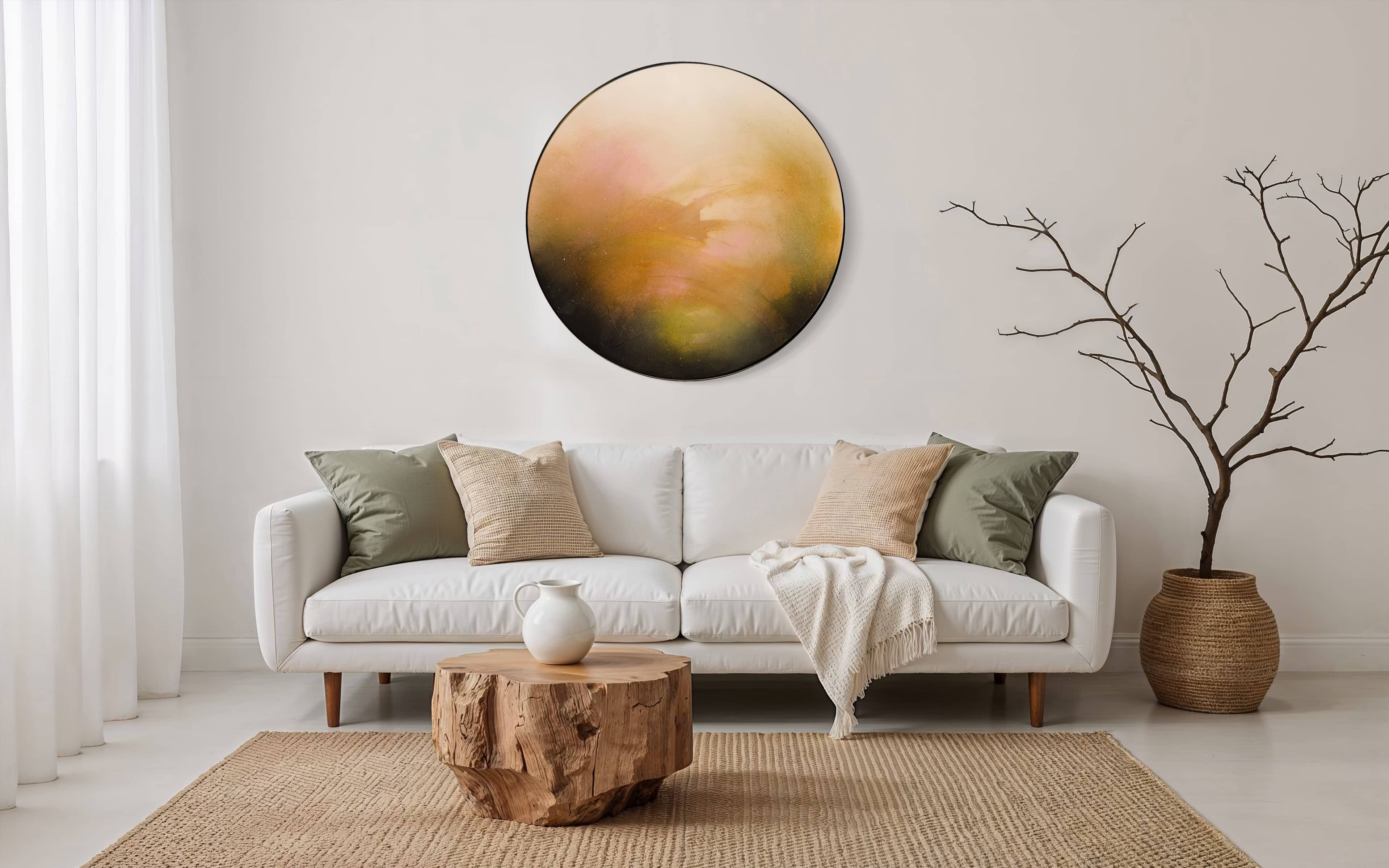 A modern living room with a white sofa and "Only Now I See The Light" by Kate Mayer above the table.