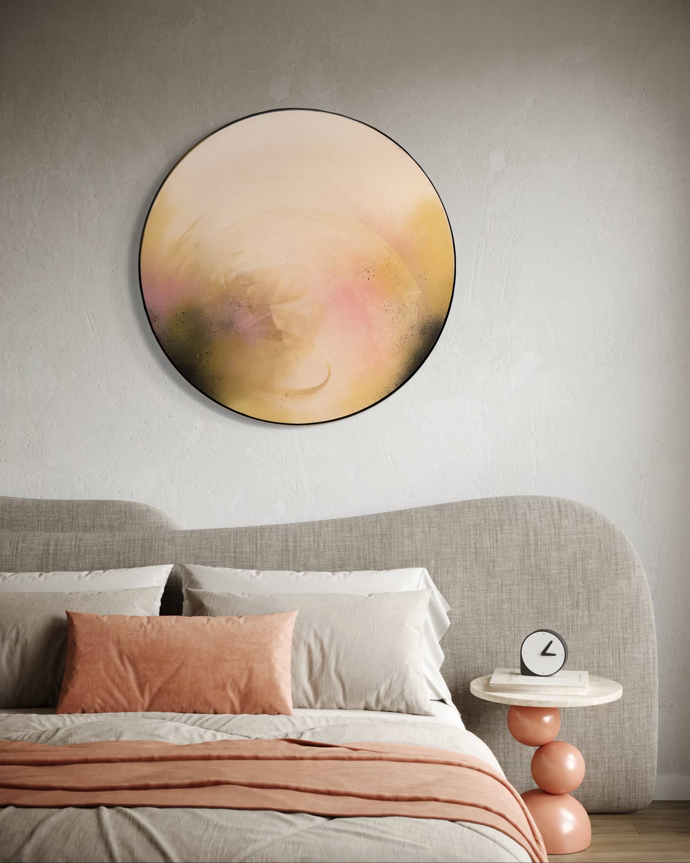 A modern bedroom featuring “You Made The Moon Our Mirrorball” by Kate Mayer, peach bedding, and a clock on the side table.