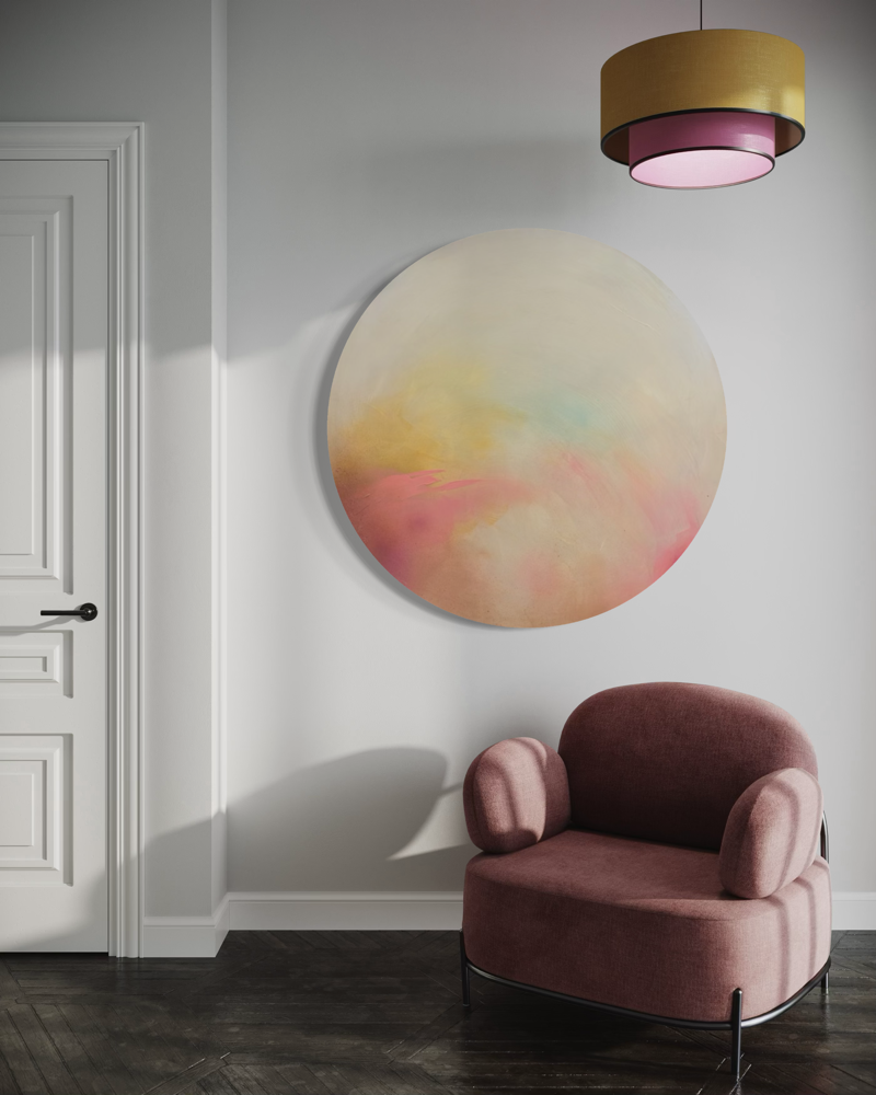 The Afterglow of Connection by Kate Mayer hangs above a mauve chair and modern pendant light.