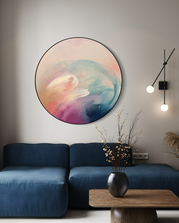 For Every Mountain“ by Kate Mayer in a handmade float frame above a blue sofa and modern lights in a cozy living room.
