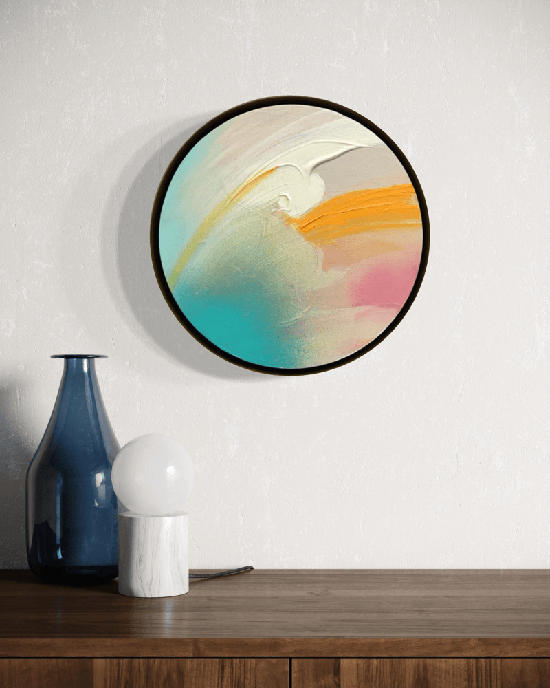 Brighter Day“ by Kate Mayer, an acrylic on plywood, hangs above a table with vases, lamp & metal float frame.